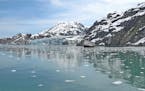 Glacier Bay channel near Margerie Glacier in Alaska, view of water and mountains.