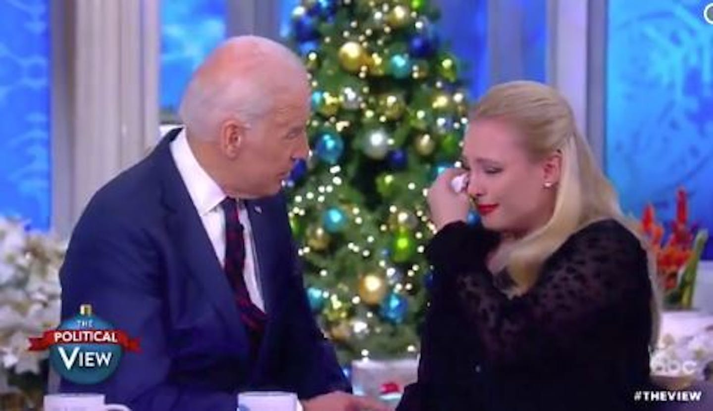 Former Vice President Joe Biden consoles "The View" panelist Meghan McCain, daughter of ailing Sen. John McCain.