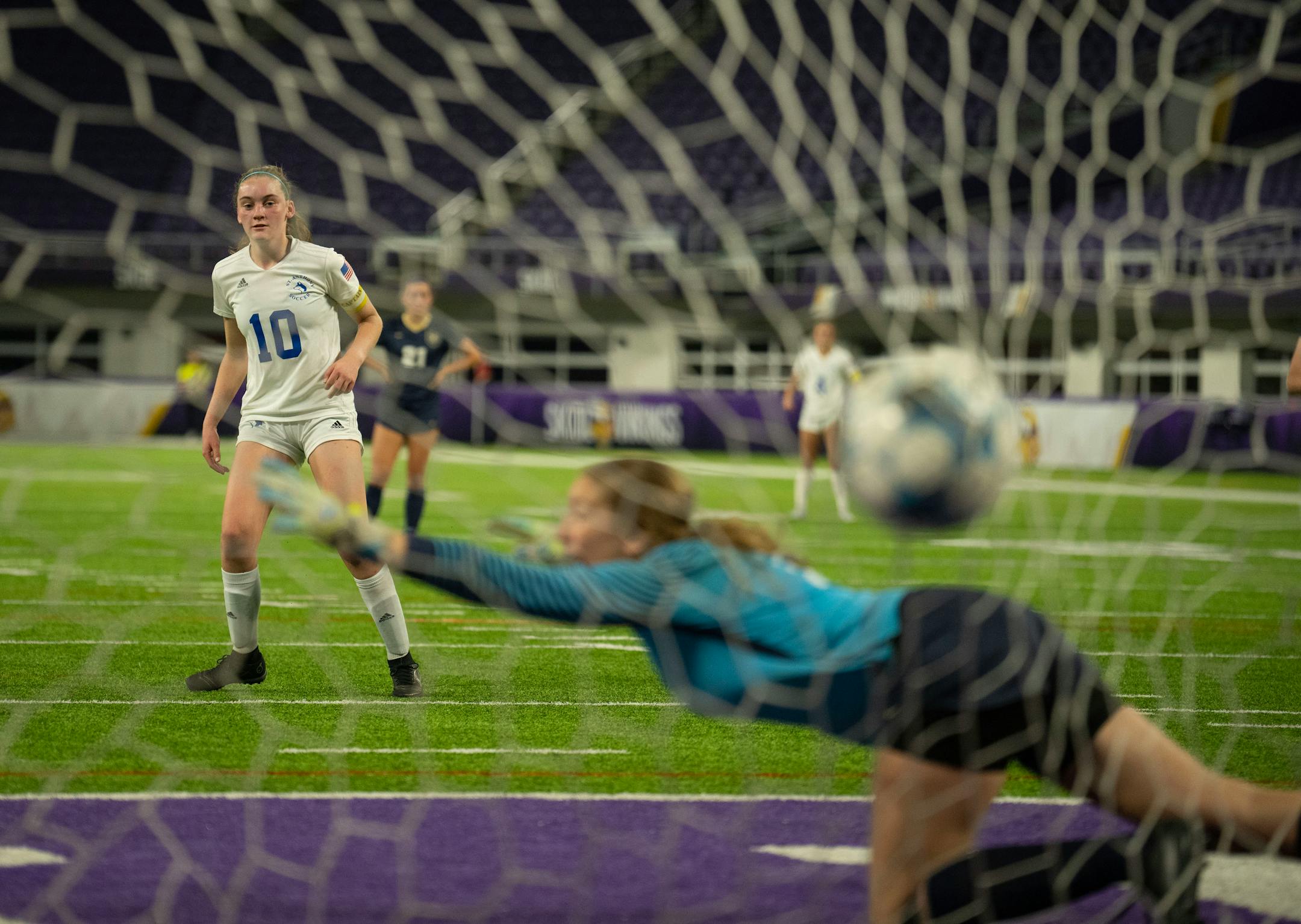 St. Anthony Village Huskies Meghan Przybilla (10) watched after she kicked a penalty kick to score what proved to be the game winner on Providence Academy keeper Grace Counts (1) in the second half of their Class 1A semi-final state tournament game Wednesday, Nov. 2, 2022 at U.S. Bank Stadium in Minneapolis. The St. Anthony Village Huskies defeated the Providence Academy Lions 4-3 in a girl's Class 1A soccer tournament semi-final game. ] JEFF WHEELER • Jeff.Wheeler@startribune.com