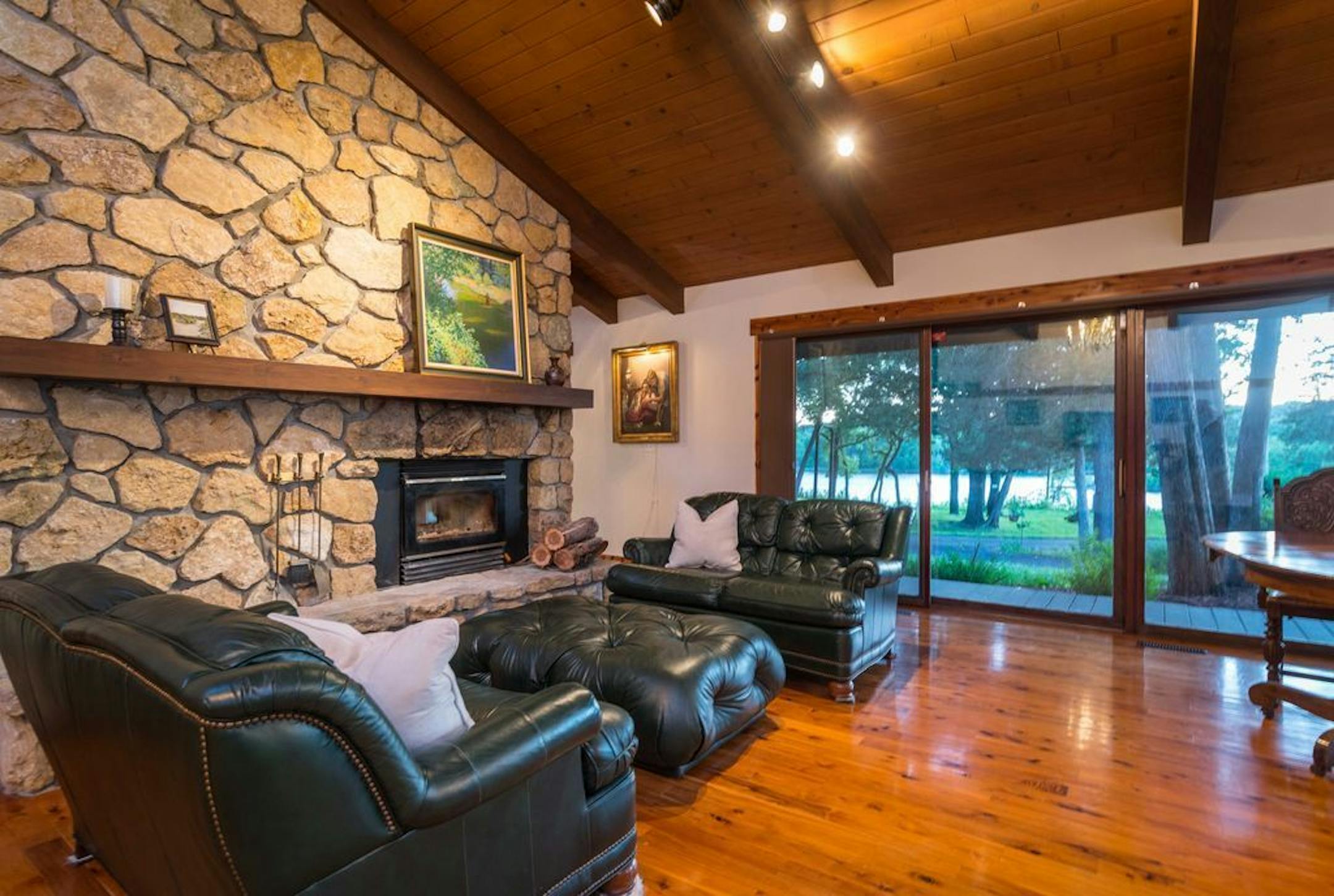 One of the sitting areas with a woodburning fireplace made of stone quarried on the island.