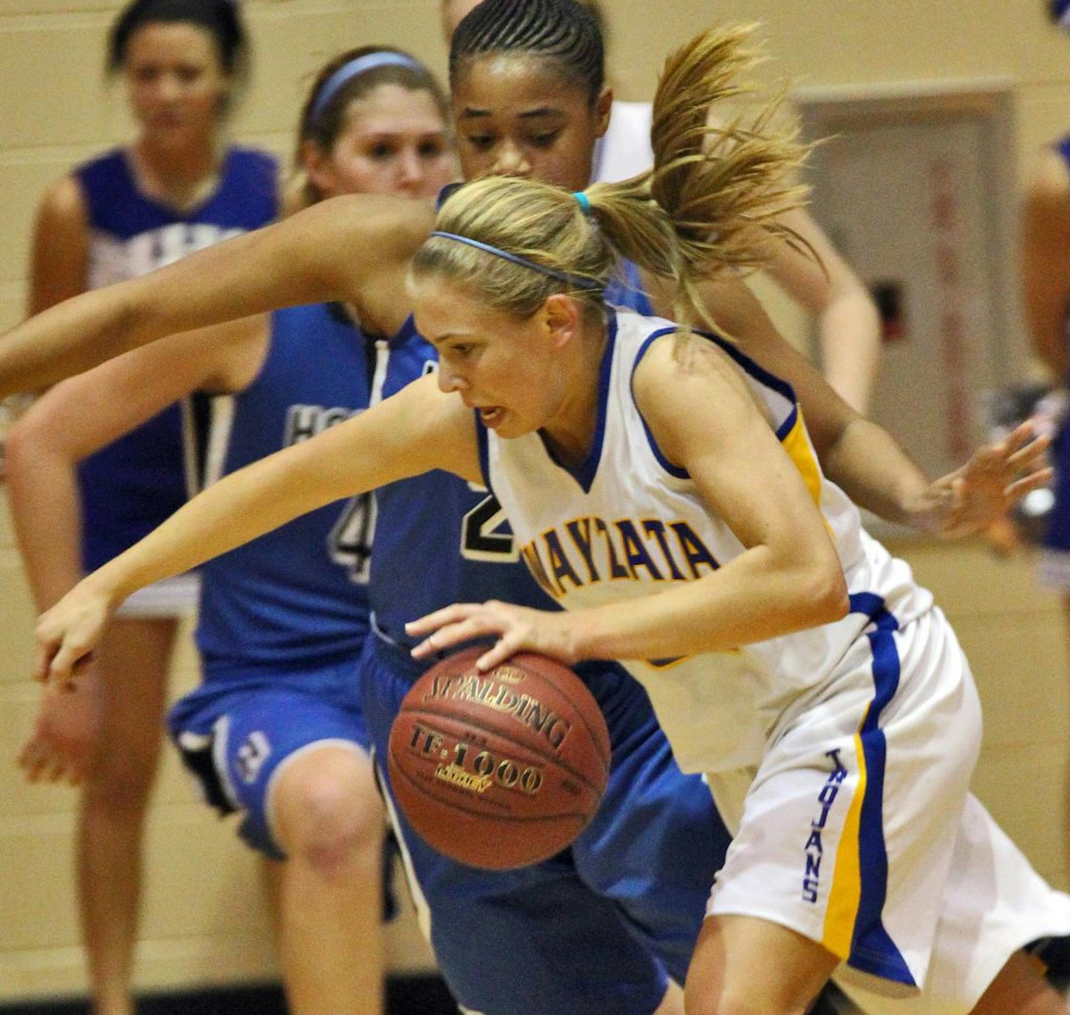 Wayzata's Katie Schulz dribbled around the Hopkins defense.