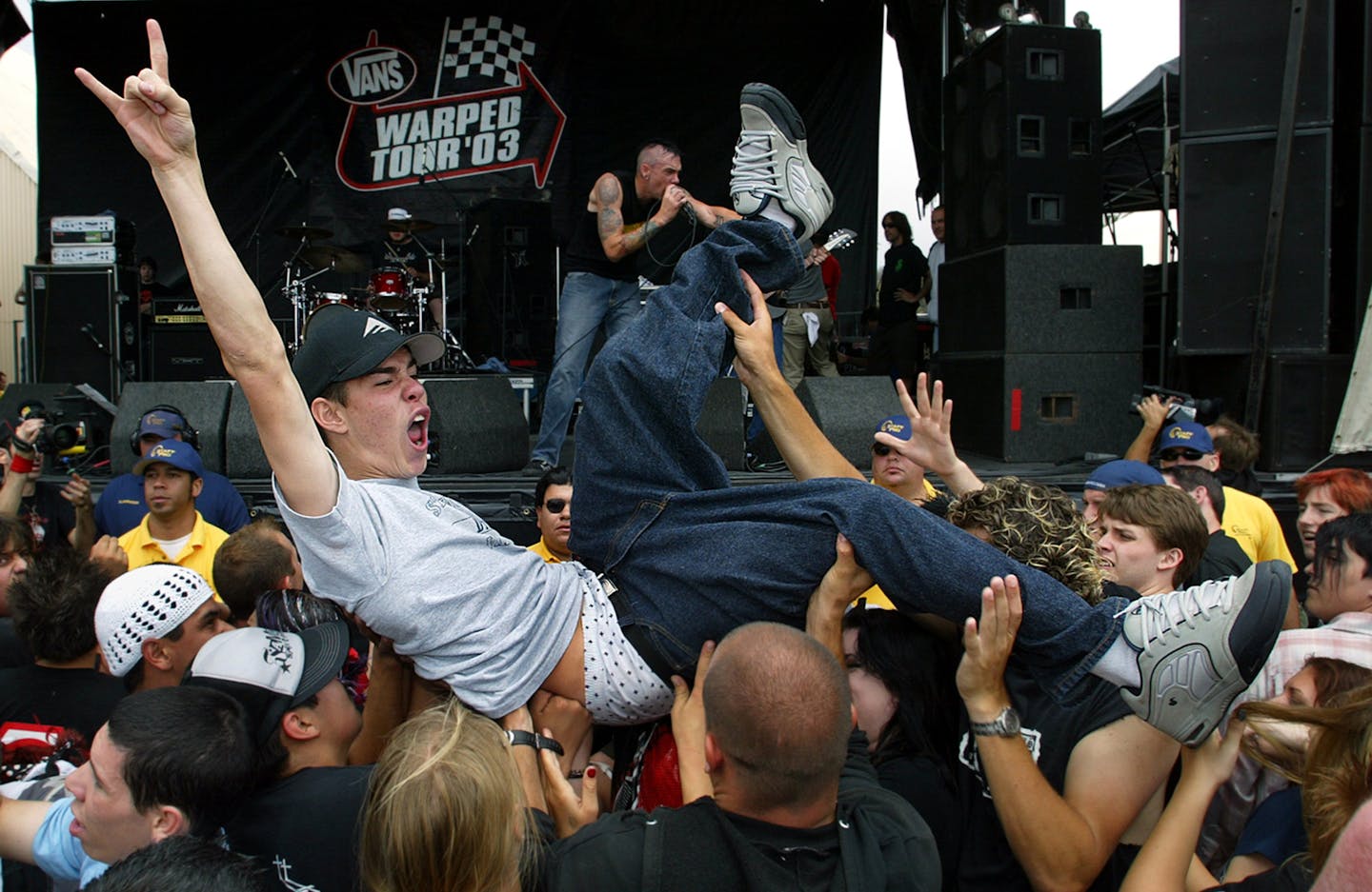 Concertgoers in 2003 in Ventura, Calif. Started in 1995 as a less arty answer to Lollapalooza, the Warped Tour became a vehicle for skateboarder punk bands and later more emo-flavored bands.