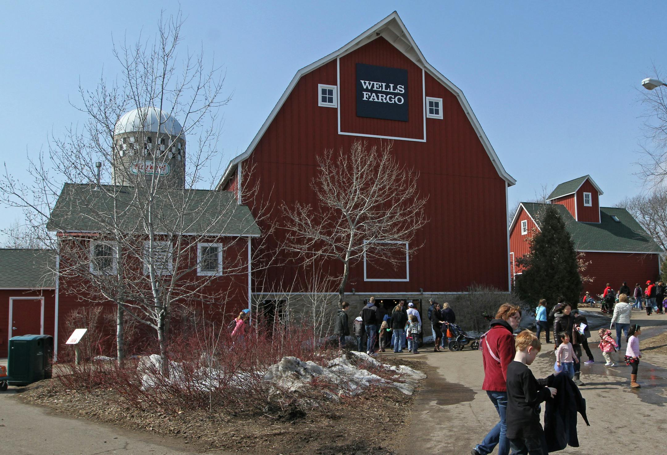 (left to right) People packed the Minnesota Zoo's Farm Babies exhibit on 3/29/13. The annual spring event features baby piglets, lambs, calves, goat kids, bunnies, ducklings and bunnies, plus the animals parents. Farm Babies runs through April 30, 2013.] Bruce Bisping/Star Tribune bbisping@startribune.com CORRECTED DATE ON CAPTION