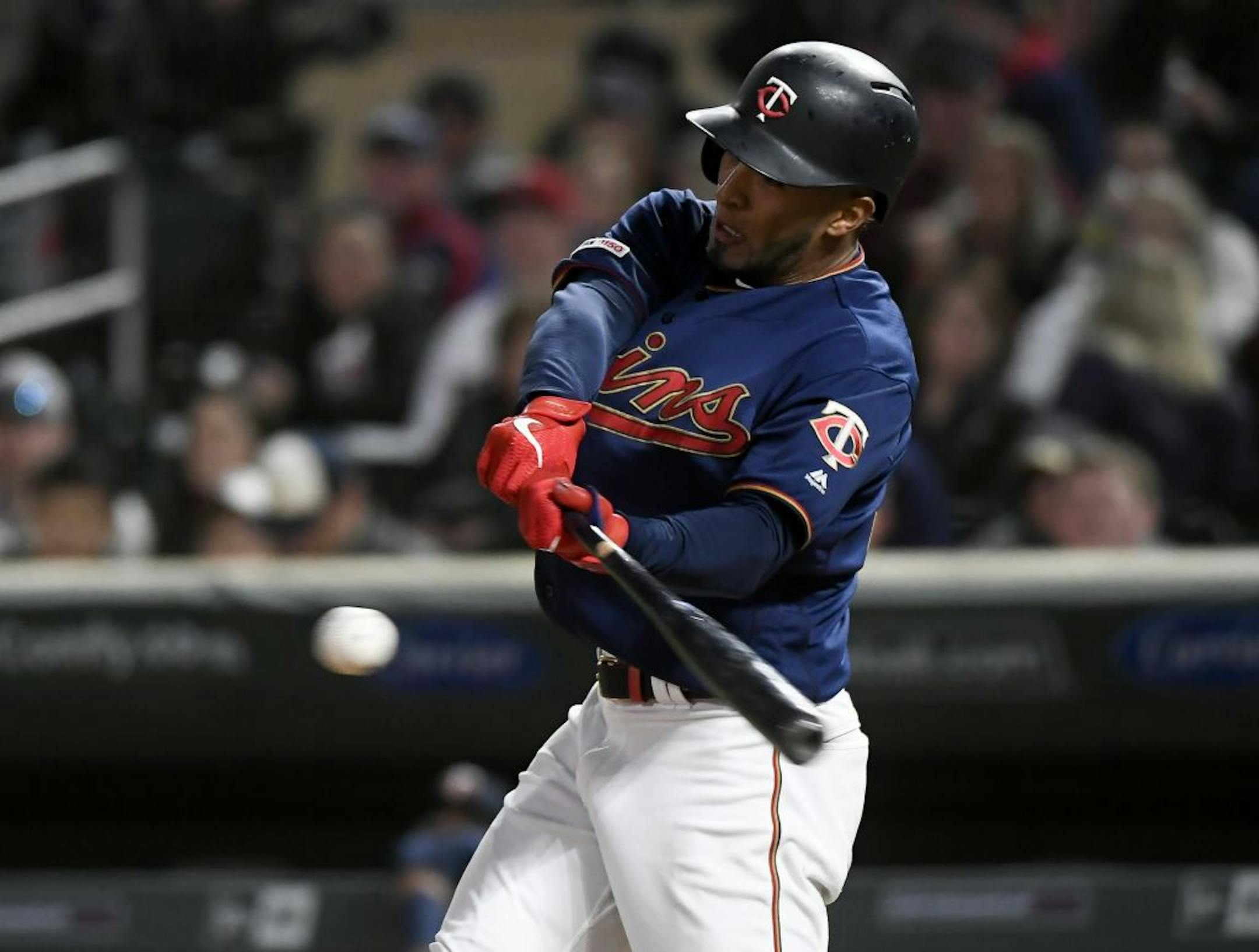 Minnesota Twins left fielder Eddie Rosario (20) hit a single in the bottom of the sixth inning against the Detroit Tigers.