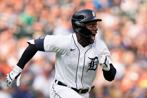 Detroit Tigers' Akil Baddoo reacts after his three-run RBI triple to center during the second inning of the second baseball game of a doubleheader aga
