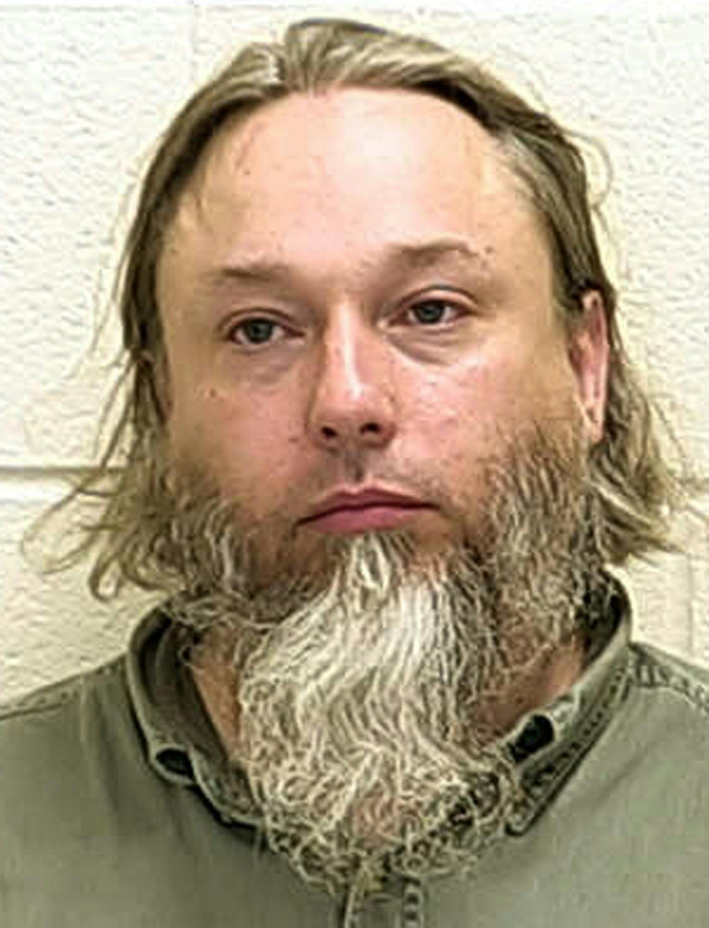 This undated photo provided by The Ford County Sheriff's Office in Paxton, Ill., shows Michael Hari. Jury selection is scheduled to begin Monday, Nov. 2, 2020, in the trial of Hari, the leader of an Illinois anti-government group who's accused of being the mastermind behind the 2017 bombing of a Minnesota mosque. (Ford County Sheriff's Office via AP)