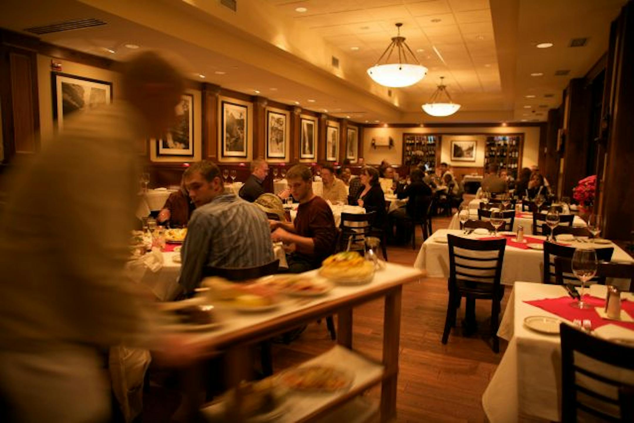 Kaminski Bros. Chop House has very larger servings, on this cart is steak, lobster, pasta and mash potatoes.