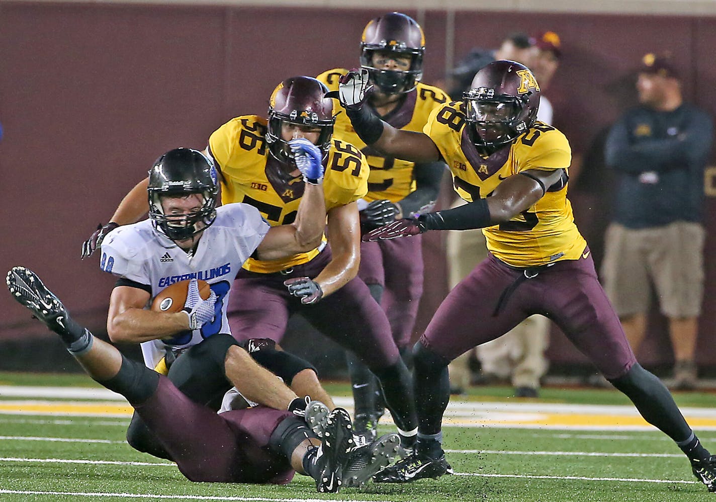 Minnesota defense was too much for Eastern Illinois wide receiver Adam Drake as he was brought down during the fourth quarter of the opening game against Eastern Illinois, Thursday, August 28, 2014 in Minneapolis, MN. ] (ELIZABETH FLORES/STAR TRIBUNE) ELIZABETH FLORES &#x2022; eflores@startribune.com