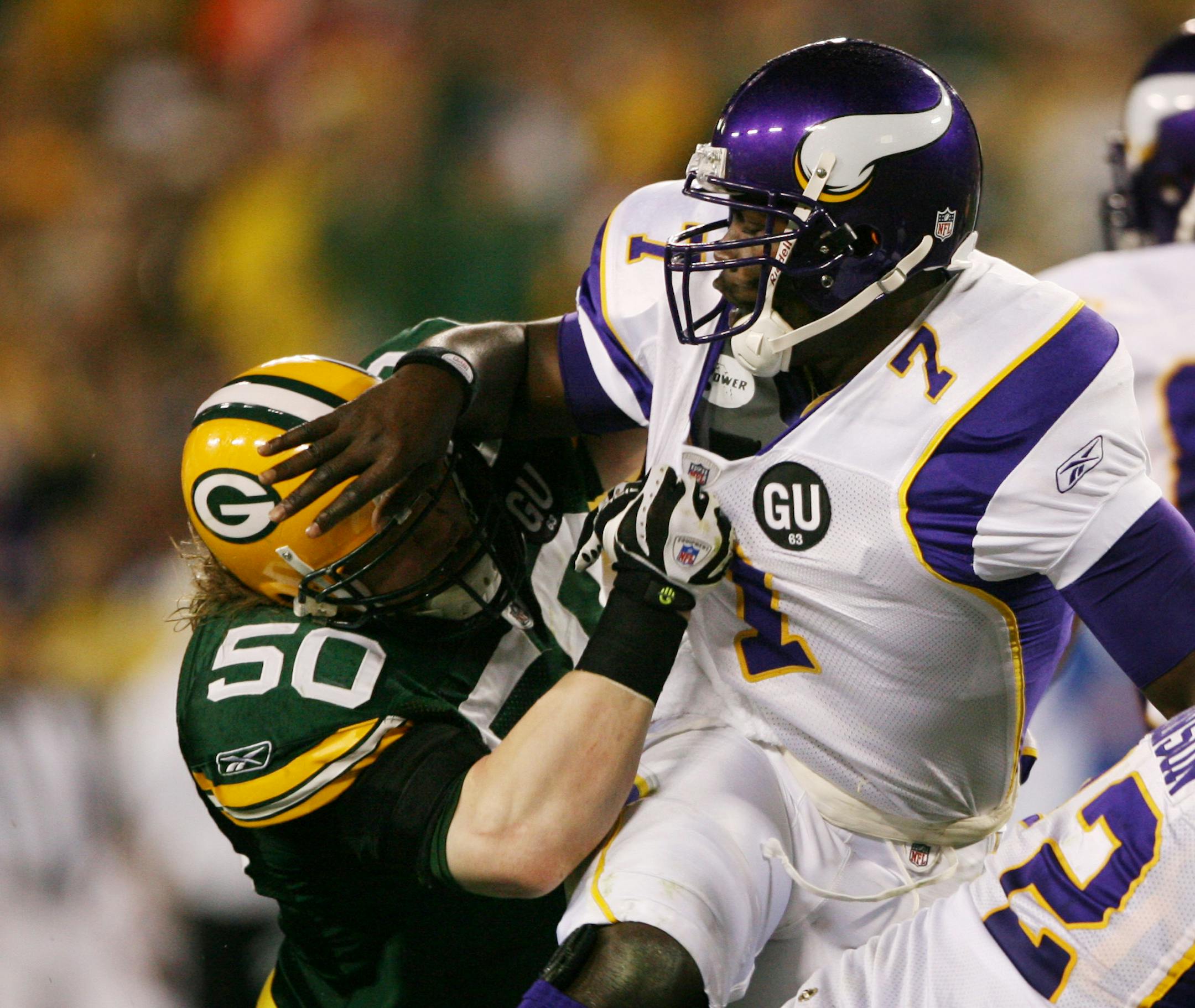 Pakers A.J Hawk put pressure on Tarvaris Jackson in the 3rd quarter.