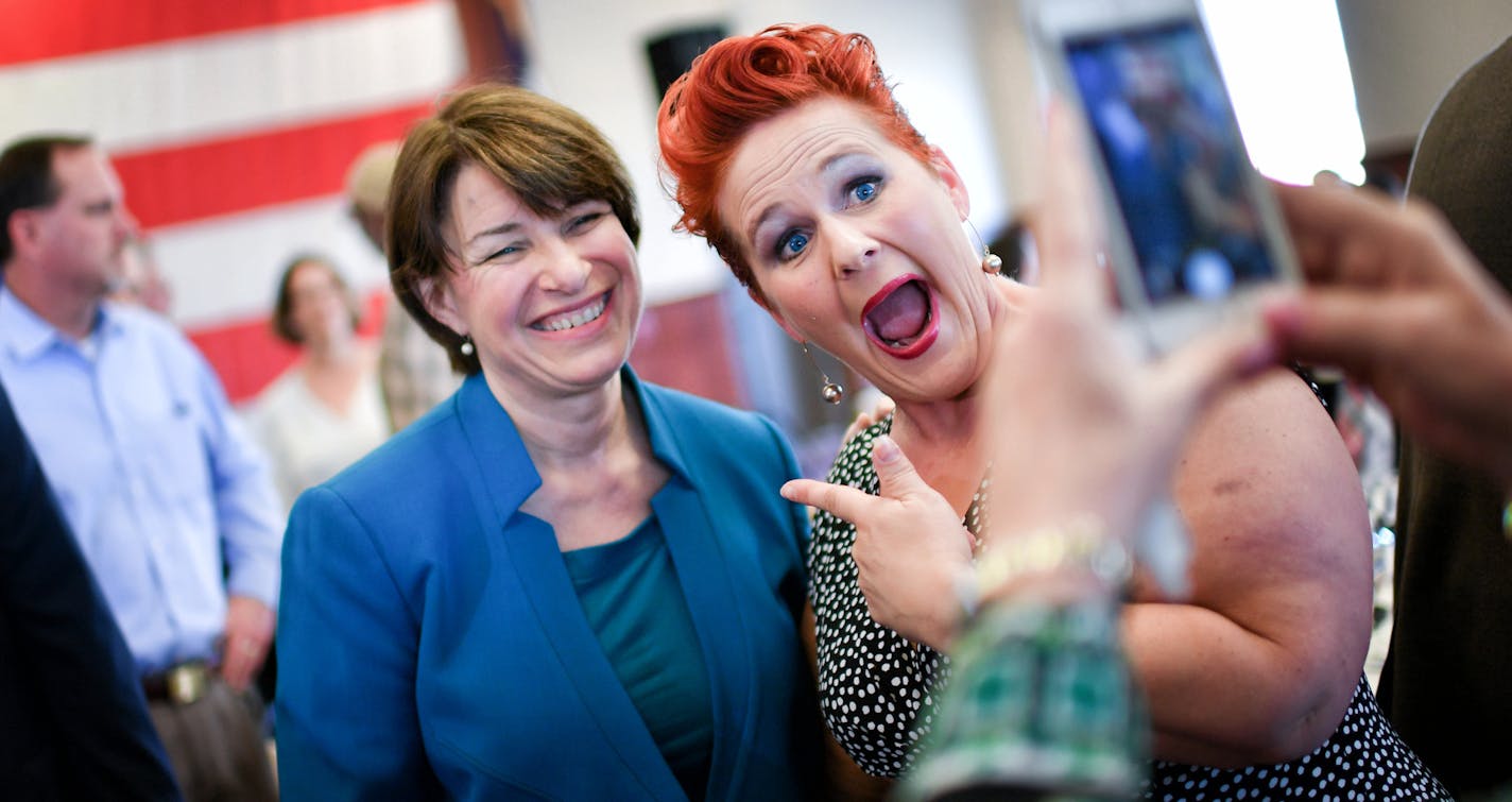 Sen. Amy Klobuchar posed with Heather Ryan, chair of the East Des Moines Democrats at the fund-raising dinner.