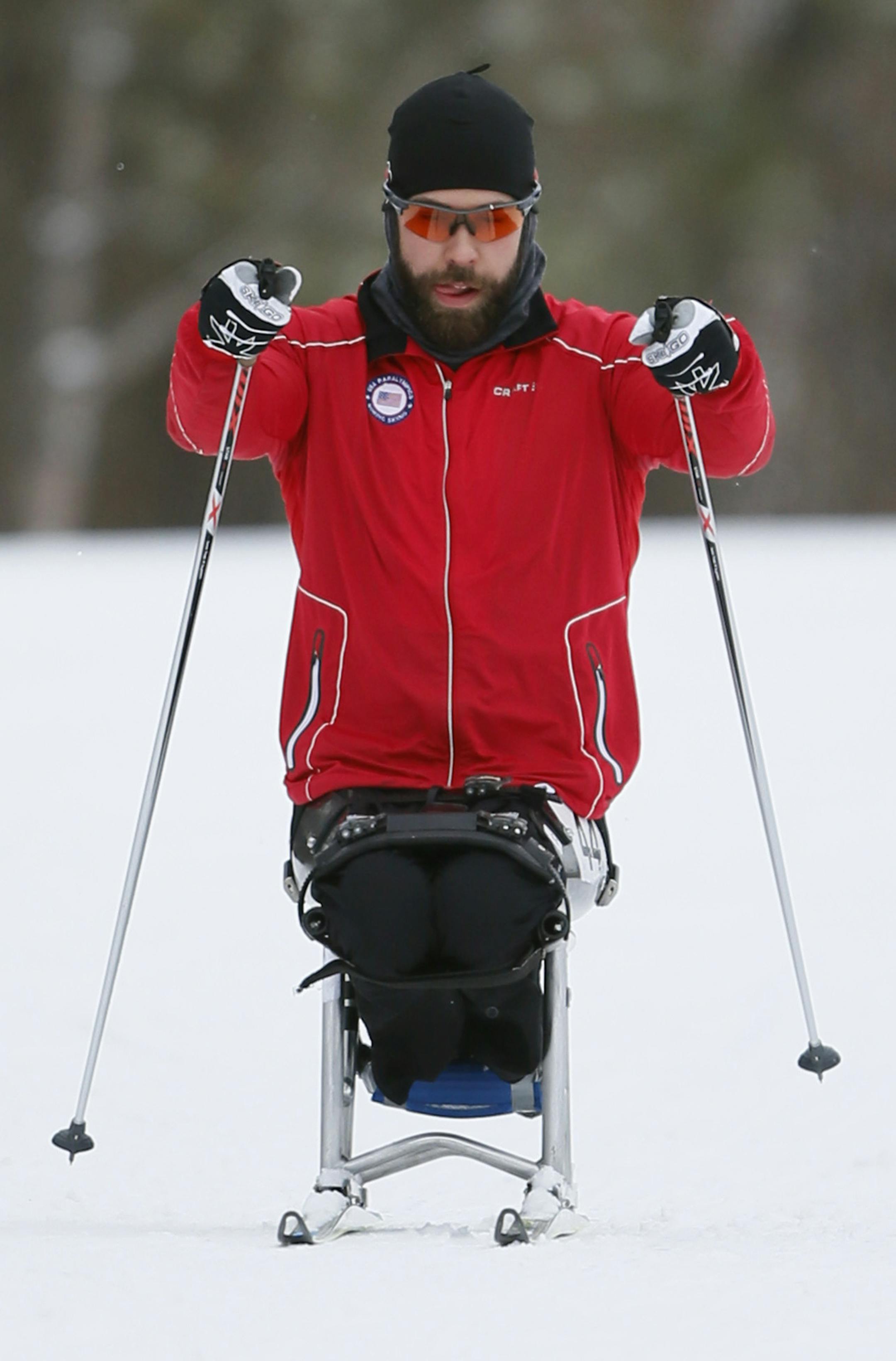 Park Rapids native Aaron Pike has been one of the top wheelchair marathoners in the U.S. for the past few years, and is now a member for the US. He now a member of the Paralympics cross country skiing team that practice Wednesday at Hyland Hills January 21, 2015 Bloomington, MN.] Jerry Holt/ Jerry.Holt@Startribune.com