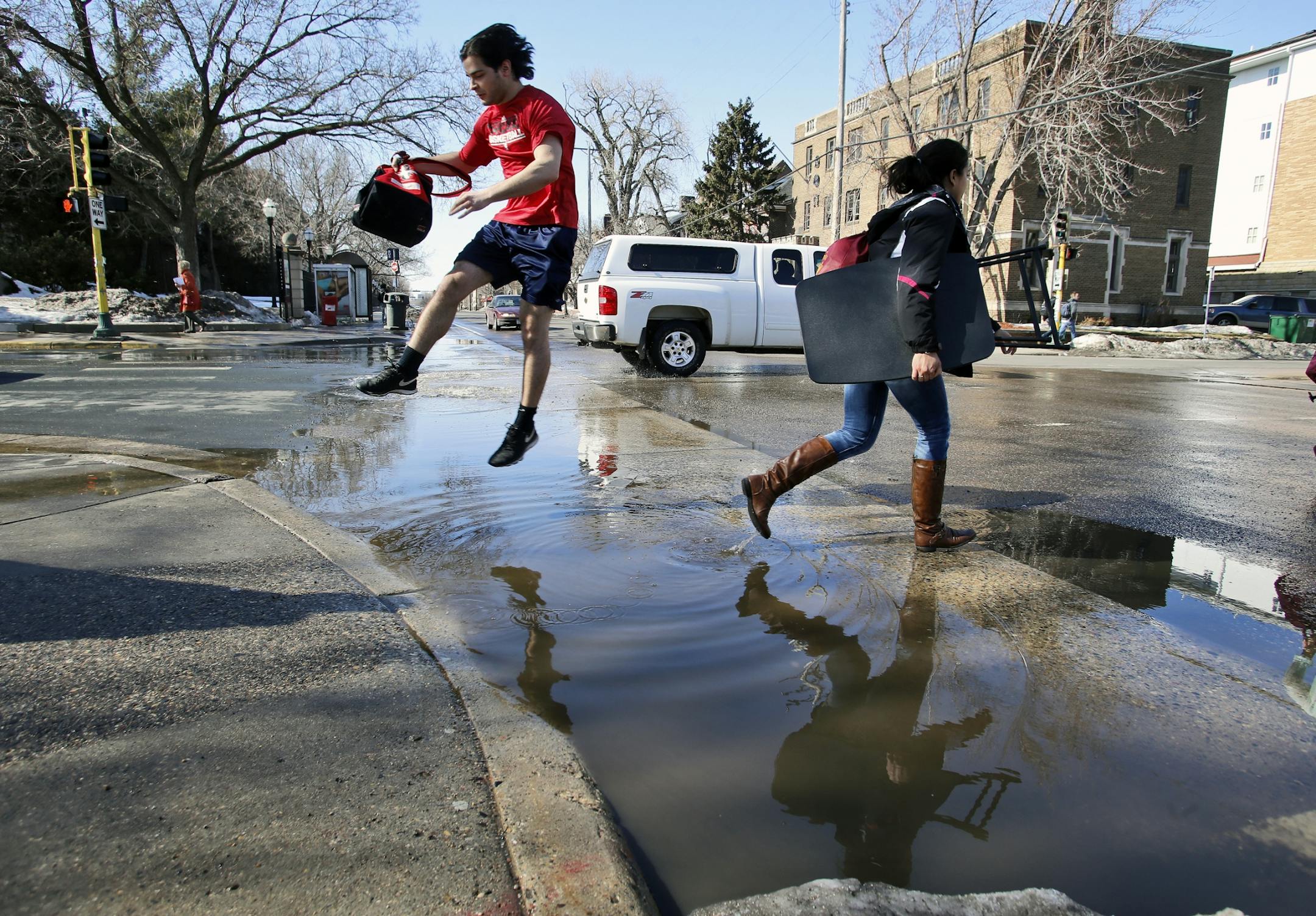 U of M students on the way home from classes Thursday afternoon found plenty of obstacles in the form of puddles of melted snow as temperatures touched 50-degrees in parts of the metro area.