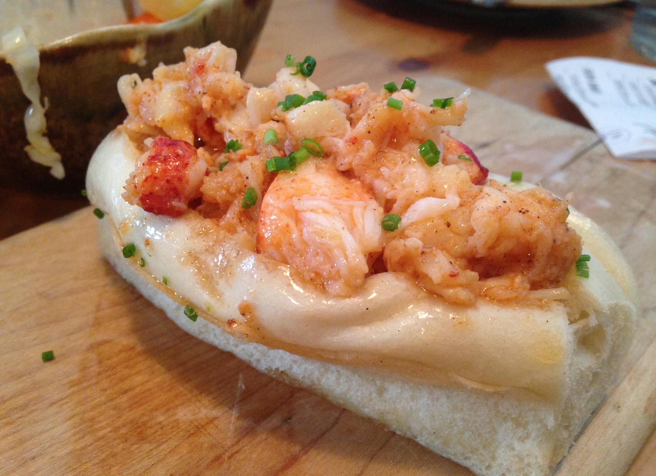 The lobster roll at Eventide Oyster Co. is doused in a bit of brown butter and served in a puffy, split-top Asian bun. (Steve Dolinsky/Chicago Tribune/TNS)