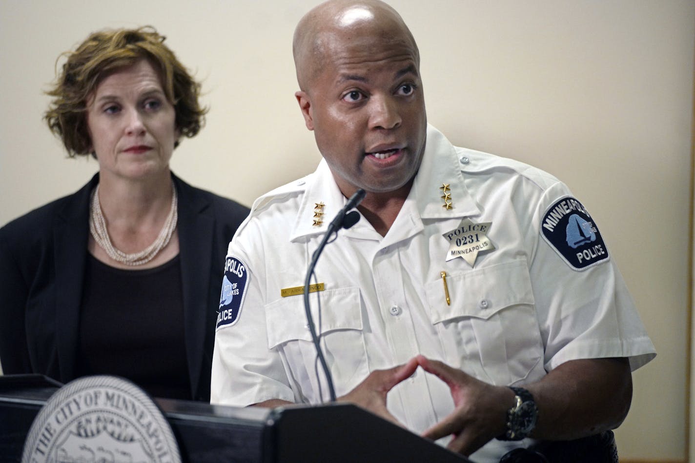 Assistant Police Chief Medaria Arradondo and Mayor Betsy Hodges address the latest developments in the death of Justine Damond, Tuesday, July 18, 2017, in Minneapolis, Minn. Damond, of Australia, was shot and killed on Saturday, July 15 by a Minneapolis police officer after she called 911 to report what she believed to be a possible assault. (Richard Tsong-Taatarii/Star Tribune via AP)