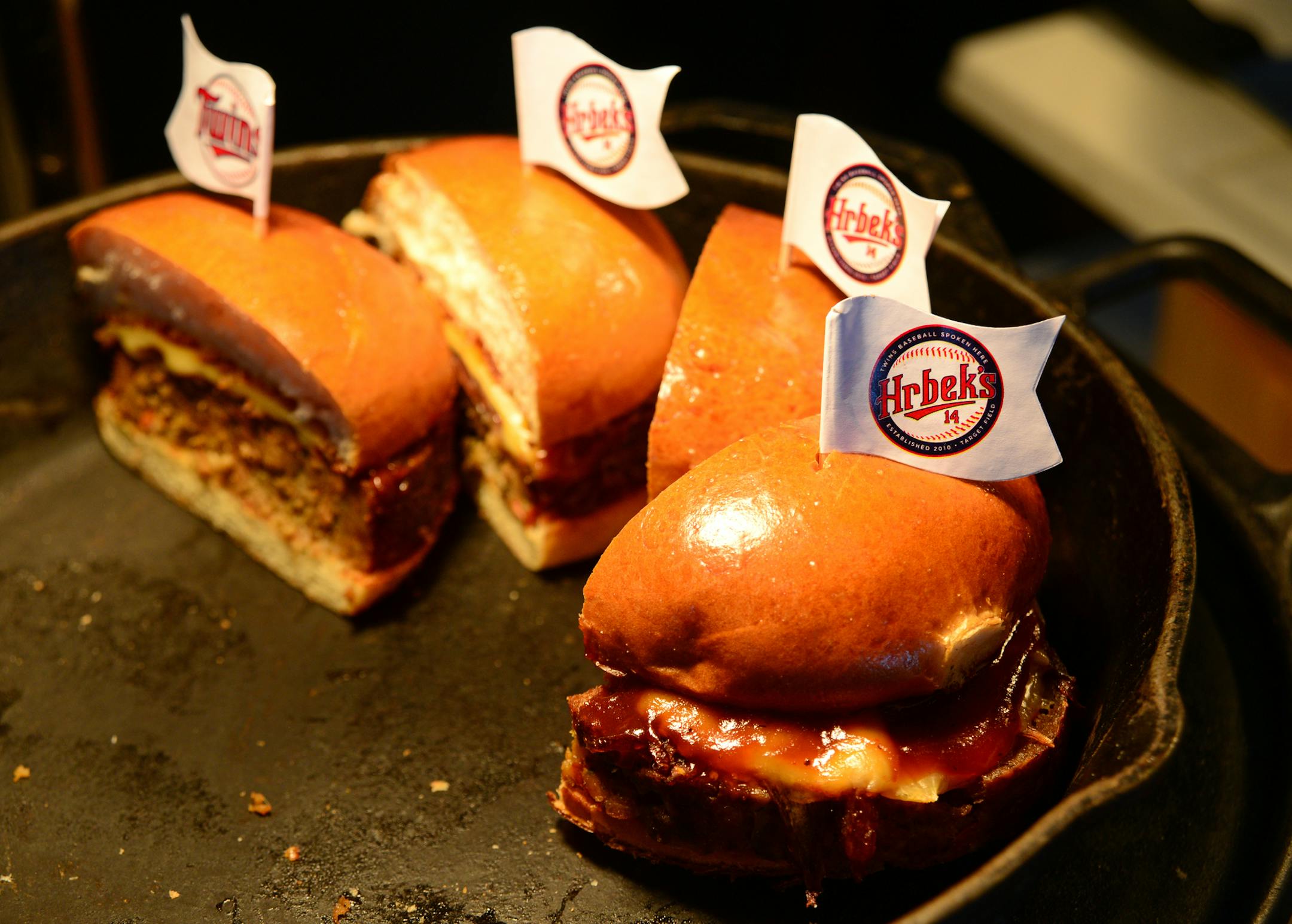 Minnesota Twins and Delaware North Sportservice hosted fourth annual food and beverage preview at Target Field, which started at Hrbek's . Kevin Smith of the Minnesota Twins talked about the range of food from lamb goat burger to fish and chips being served at Target Field. A Homemade Meatloaf sandwich with smoked gouda,caramelized red onion and tangy BBQ sauce was featured at Hrbek's] Richard.Sennott@startribune.com Richard Sennott/Star Tribune. , Minneapolis Minn. Thursday 3/28/13) ** (cq)