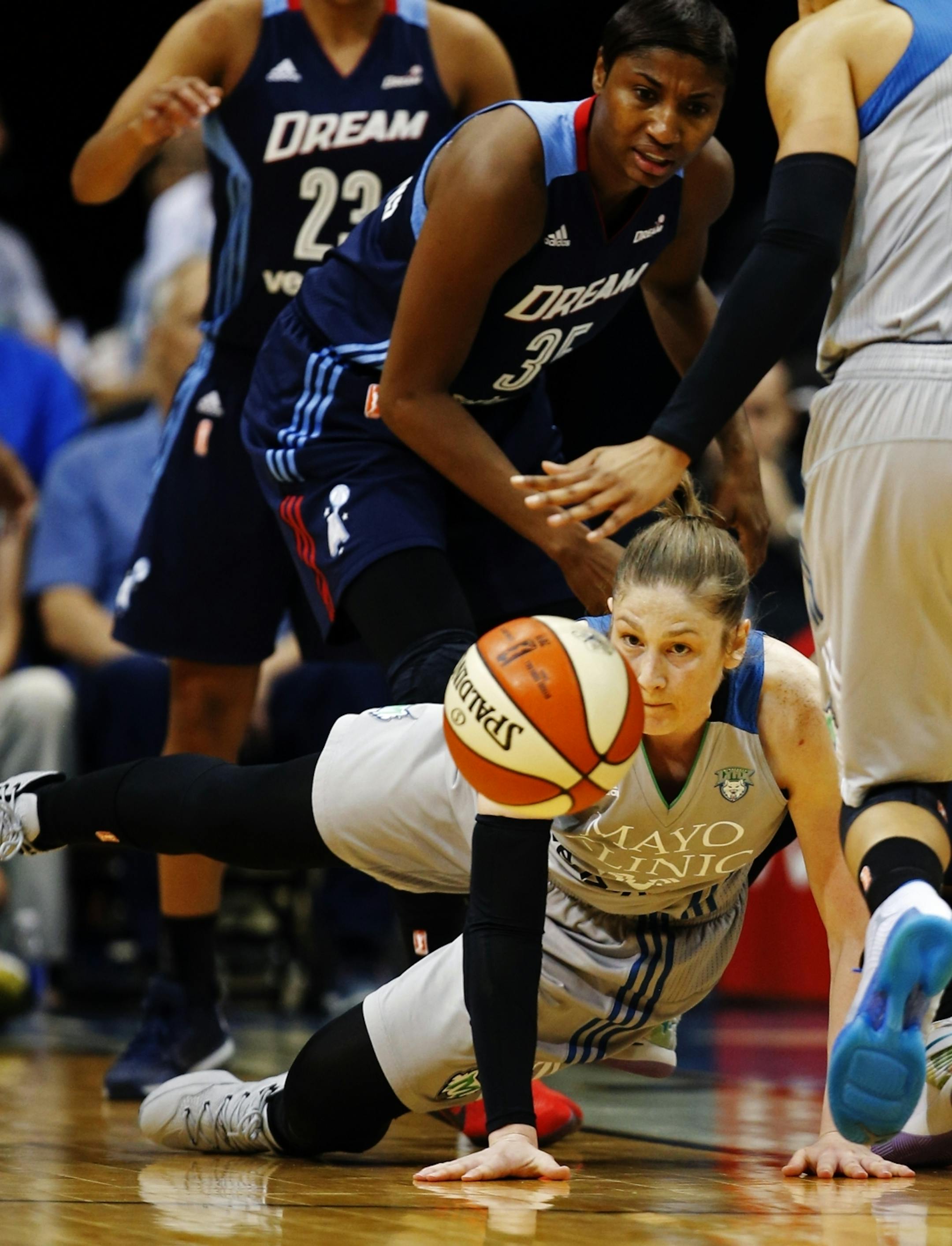 Lynx Lindsay Whalen(13) stares down a loose ball that got away.