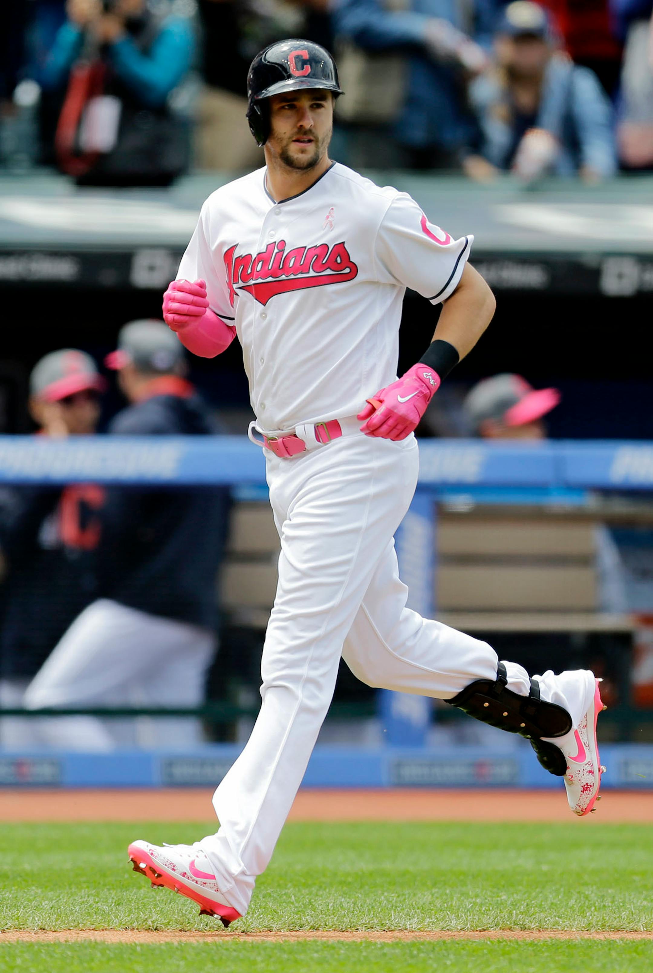 Cleveland Indians' Lonnie Chisenhall runs the bases after hitting a two-run home run off Minnesota Twins' Hector Santiago in the second inning of a baseball game, Sunday, May 14, 2017, in Cleveland. Daniel Robertson scored on the play.