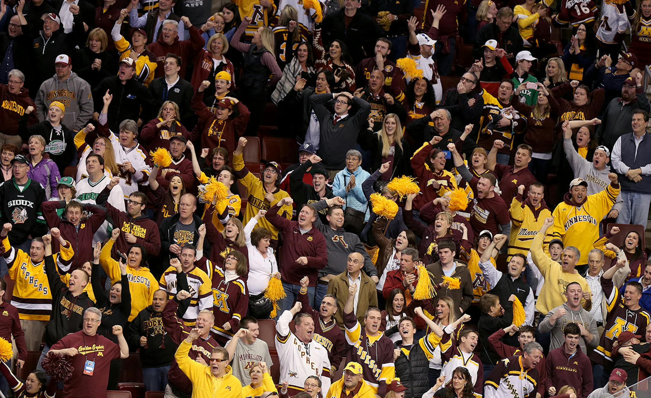 Minnesota fans celebrated the game winning goal to defeat North Dakota at the Frozen Four.
