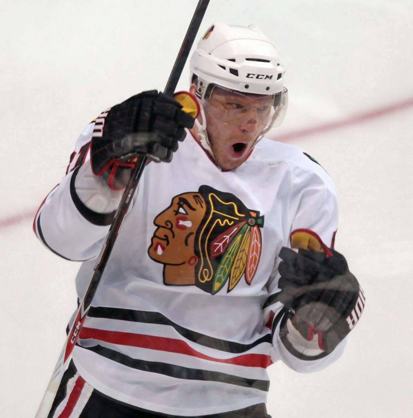 Chicago Blackhawks' Marian Hossa, of Slovakia, celebrates his goal against the Vancouver Canucks during the second period of Game 5 of an NHL hockey Stanley Cup playoffs first-round series in Vancouver, British Columbia, on Thursday, April 21, 2011.