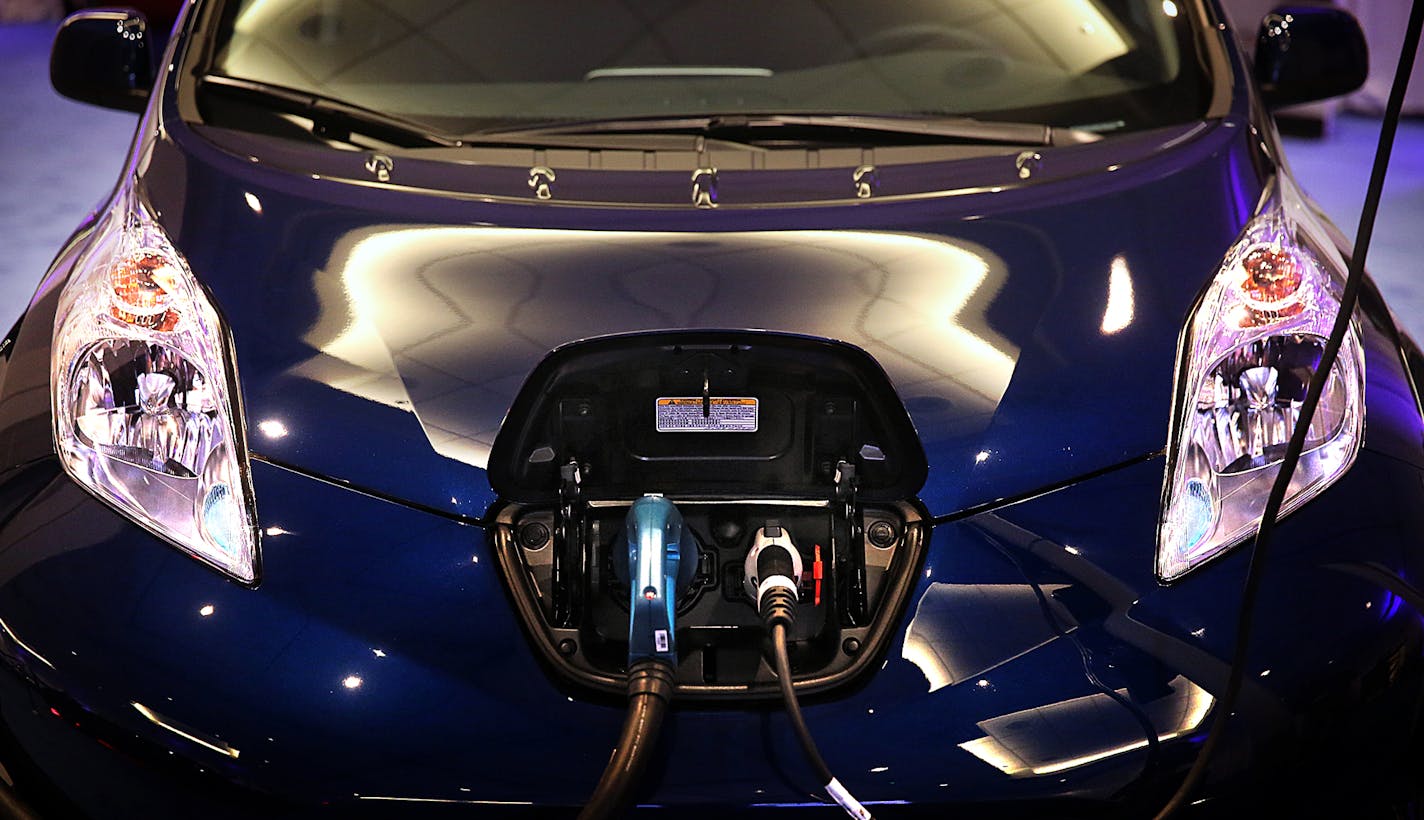 The Nissan LEAF is among the electric automobiles on display in the Electric Room at the Twin Cities Auto Show. ] JIM GEHRZ &#xef; james.gehrz@startribune.com /Minneapolis, MN / March 12, 2016 /9:00 AM - BACKGROUND INFORMATION: The Green Room at the Twin Cities Auto Show (March 12-20), which features hybrid and electric vehicles, will be renamed the Electric Room this year. But will anyone care? With gas prices at the lowest prices ever, adjusted for inflation, hybrid and especially electric veh