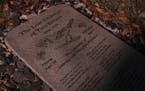 The granite marker for the graves of Maria and Christian Peterson, two siblings who in 1870 were lost in the woods near what is now Upsala, Minn., and
