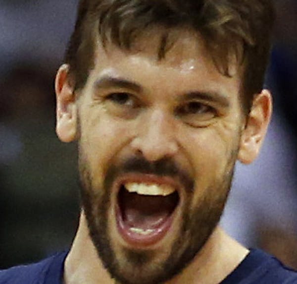 Memphis Grizzlies' Marc Gasol, of Spain, reacts to a foul call on Los Angeles Clippers' Lamar Odom during the first half of an NBA basketball game in 
