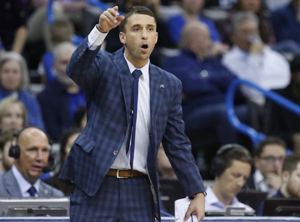 Minnesota Timberwolves interim head coach Ryan Saunders gestures in the first half of an NBA basketball game against the Oklahoma City Thunder in Okla