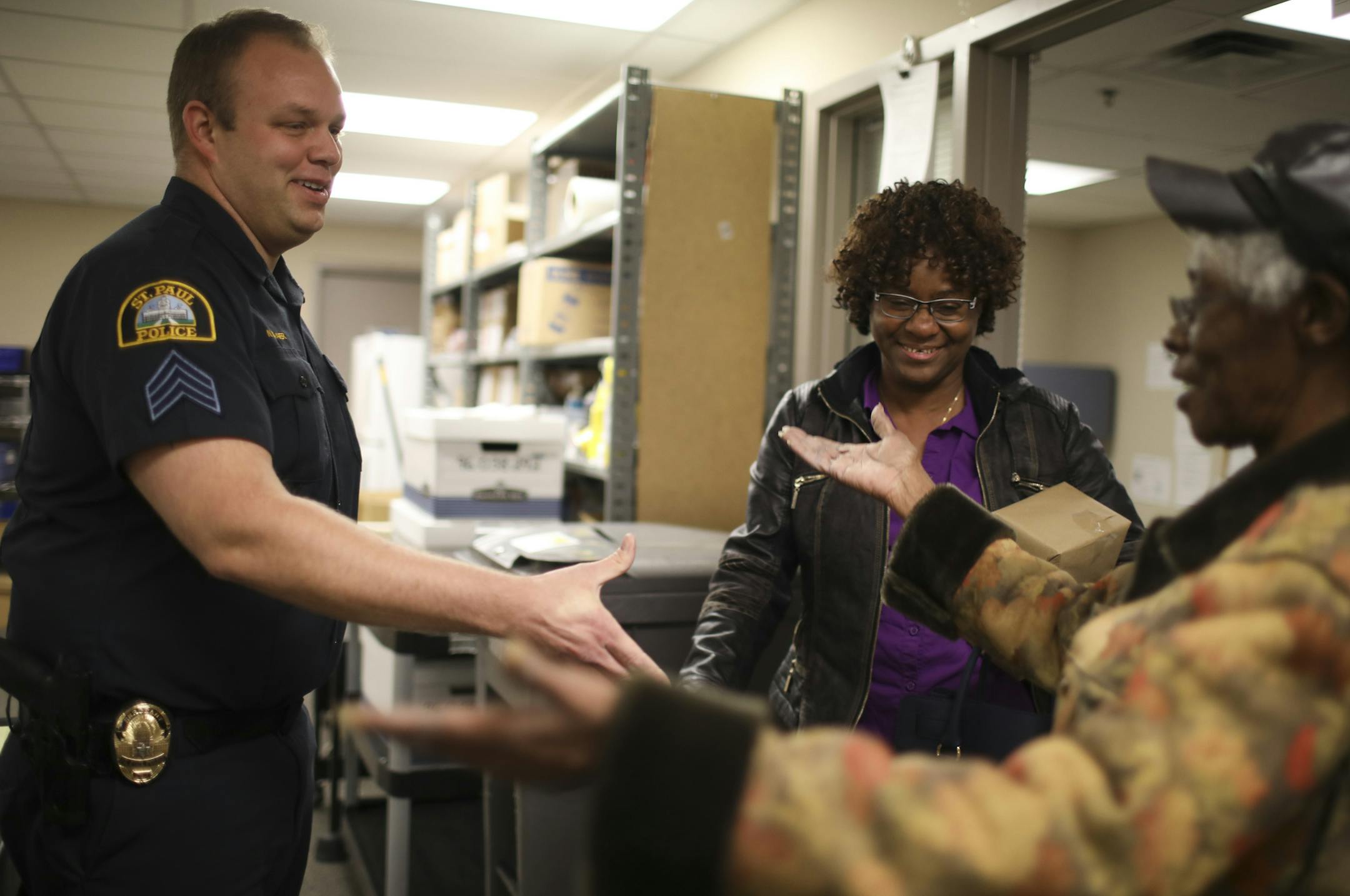 James Harris’ sister, Dovenia Harris, had a hug for Sgt. Nick Schafer in thanks for reuniting her family with her brother’s ashes Monday afternoon. Her and James’ niece, Paulette Swindeman is holding the box of James’ ashes as they prepared to leave.