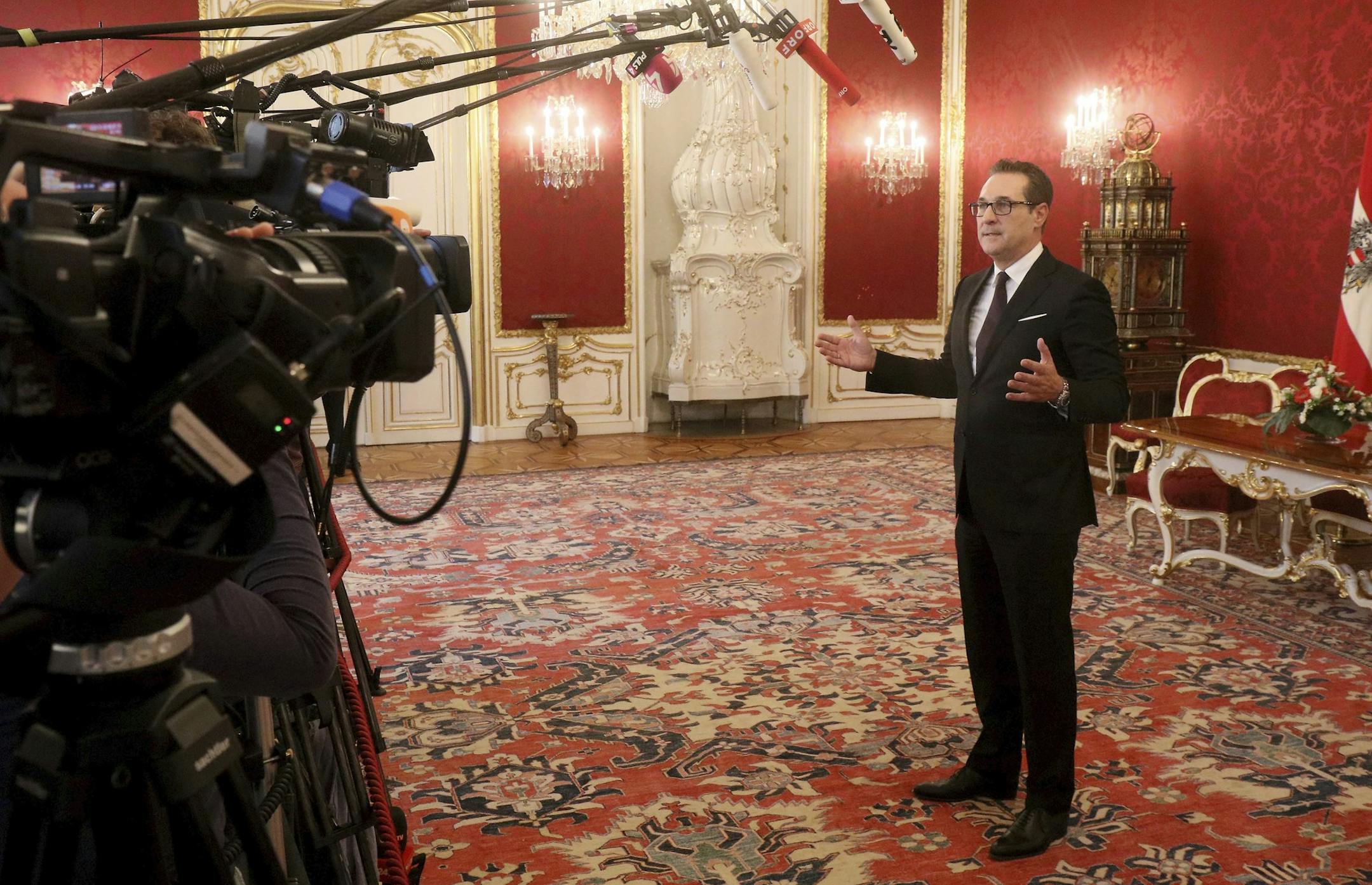 Heinz-Christian Strache, chairman of the right-wing Freedom Party, FPOE, speaks to journalists after talks with Austrian President Alexander van der Bellen following Sunday's election at the Hofburg palace in Vienna, Austria, Wednesday, Oct. 18, 2017. (AP Photo/Ronald Zak)