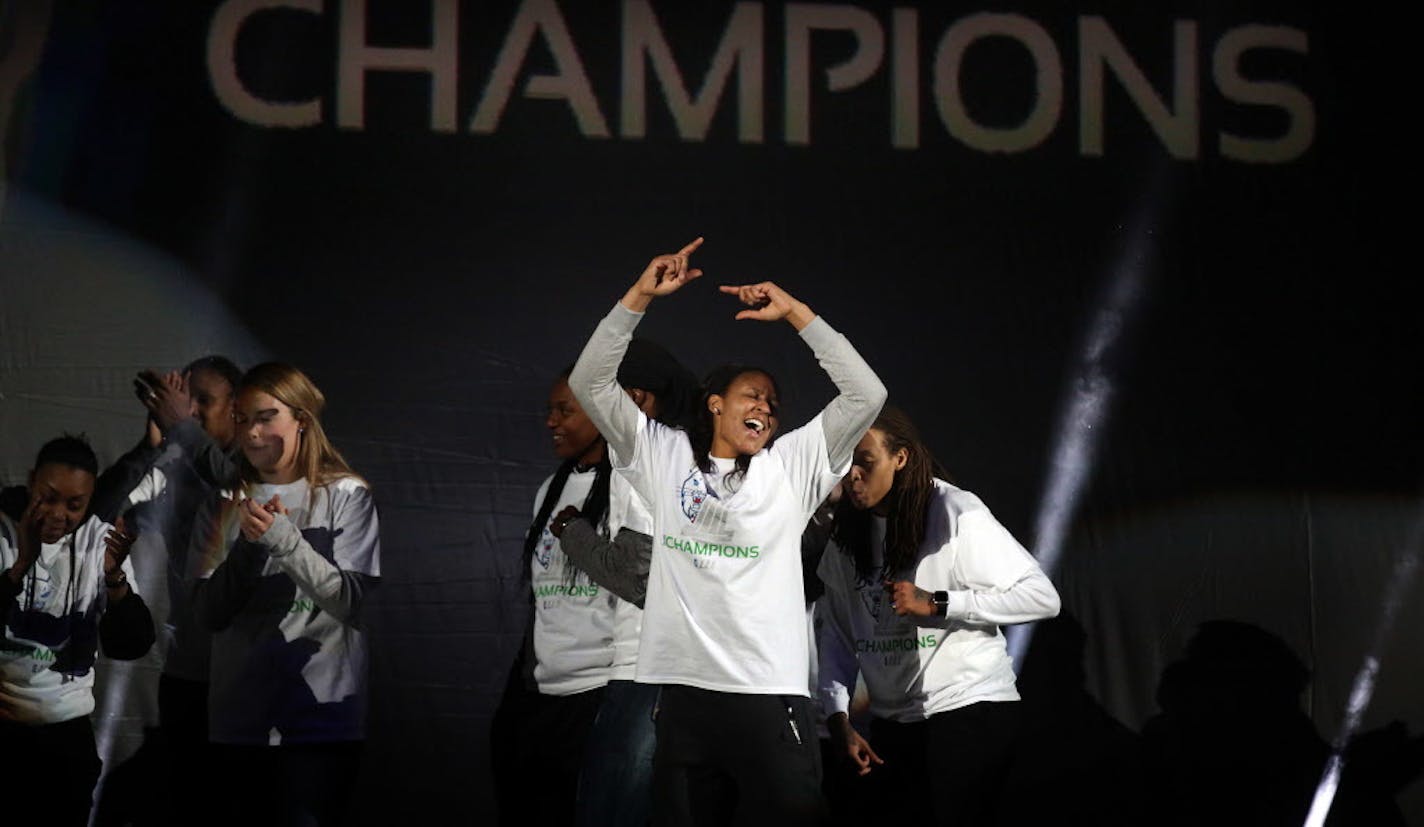 Maya Moore (center) and the rest of the Lynx team celebrated their championship. ] JIM GEHRZ � james.gehrz@startribune.com / Minneapolis, MN / October 16, 2015 / 13:30 AM � BACKGROUND INFORMATION: Fans and members of the Minnesota Lynx 2015 WNBA Championship team rally to celebrate the team�s victory at the Target Center, following a parade in downtown Minneapolis.