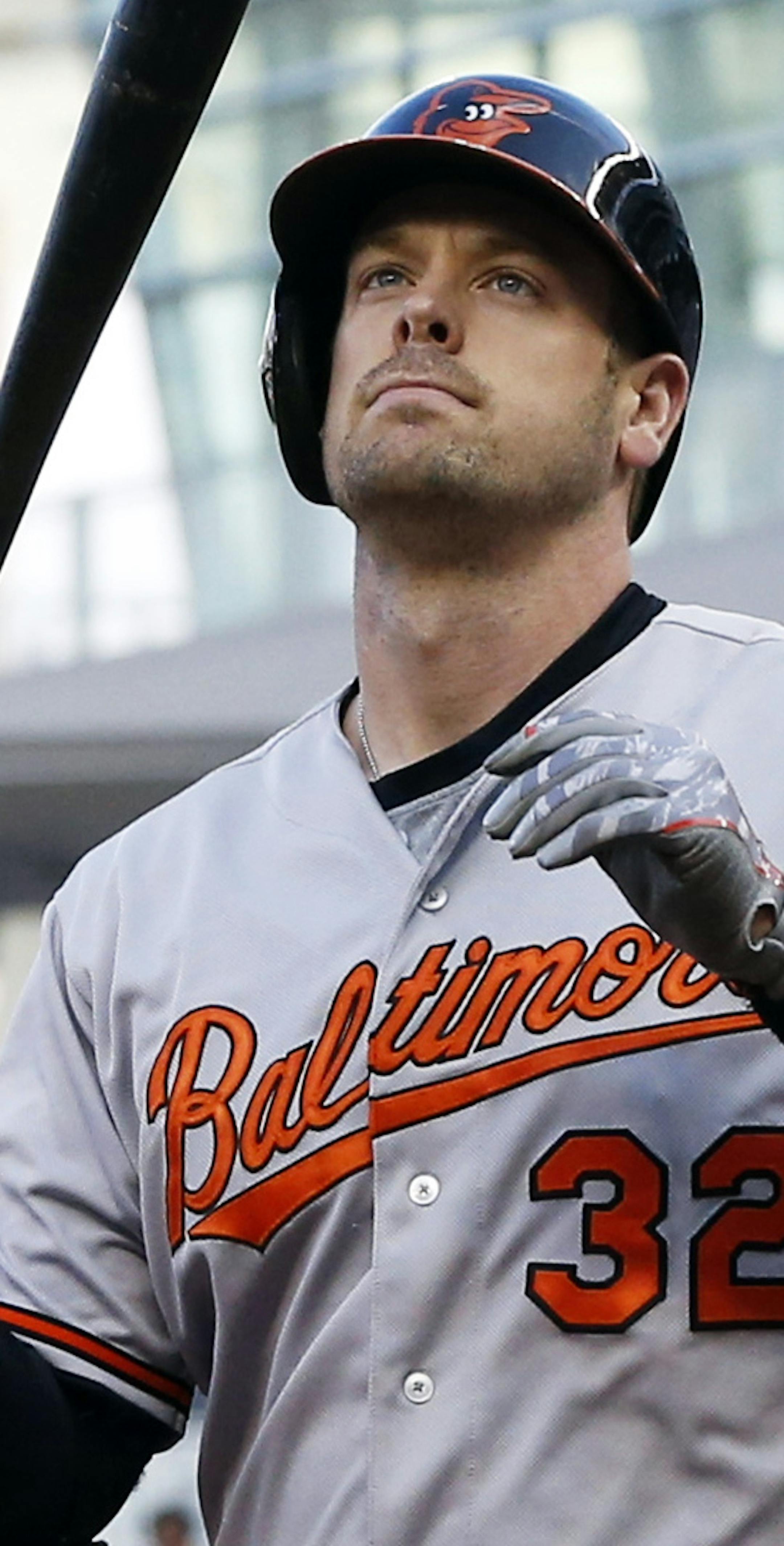 Baltimore Oriolesí Matt Wieters tosses his bat after striking out to Minnesota Twins pitcher Kyle Gibson in the first inning of a baseball game, Tuesday, July 7, 2015, in Minneapolis. (AP Photo/Jim Mone)