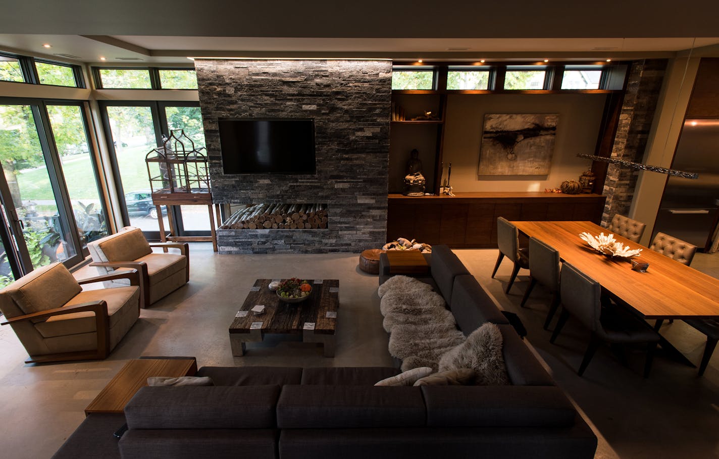 The living and dining area. ] (AARON LAVINSKY/STAR TRIBUNE) aaron.lavinsky@startribune.com Couple builds a new modern home on a small footprint designed to maximize views of Lake Calhoun. We photograph the home on Tuesday, Oct. 11, 2016 in Minneapolis, Minn.