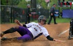 Claire Woebke, junior, 2B, scores the game winning run for St. Catherine against St. Thomas in the second game of the Super Regional. Photo courtesy o