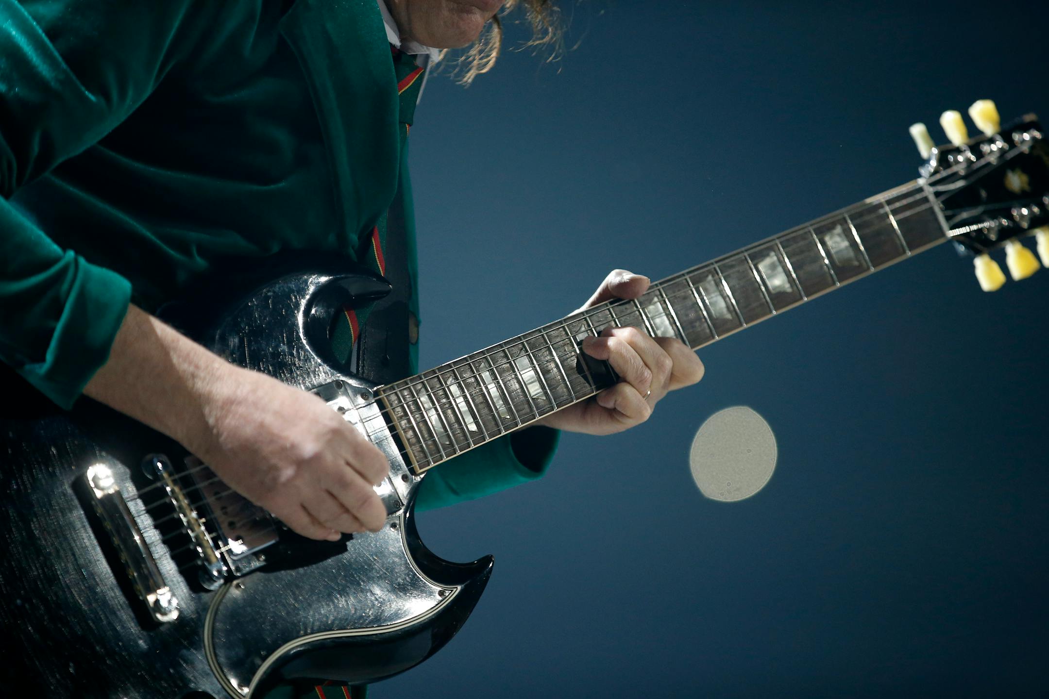 Lead guitar player Angus Young of AC/DC performed at the Xcel Energy Center on Sunday night. ] CARLOS GONZALEZ cgonzalez@startribune.com - February 14, 2016, New St. Paul, MN, Xcel Energy Center, AC/DC Concert