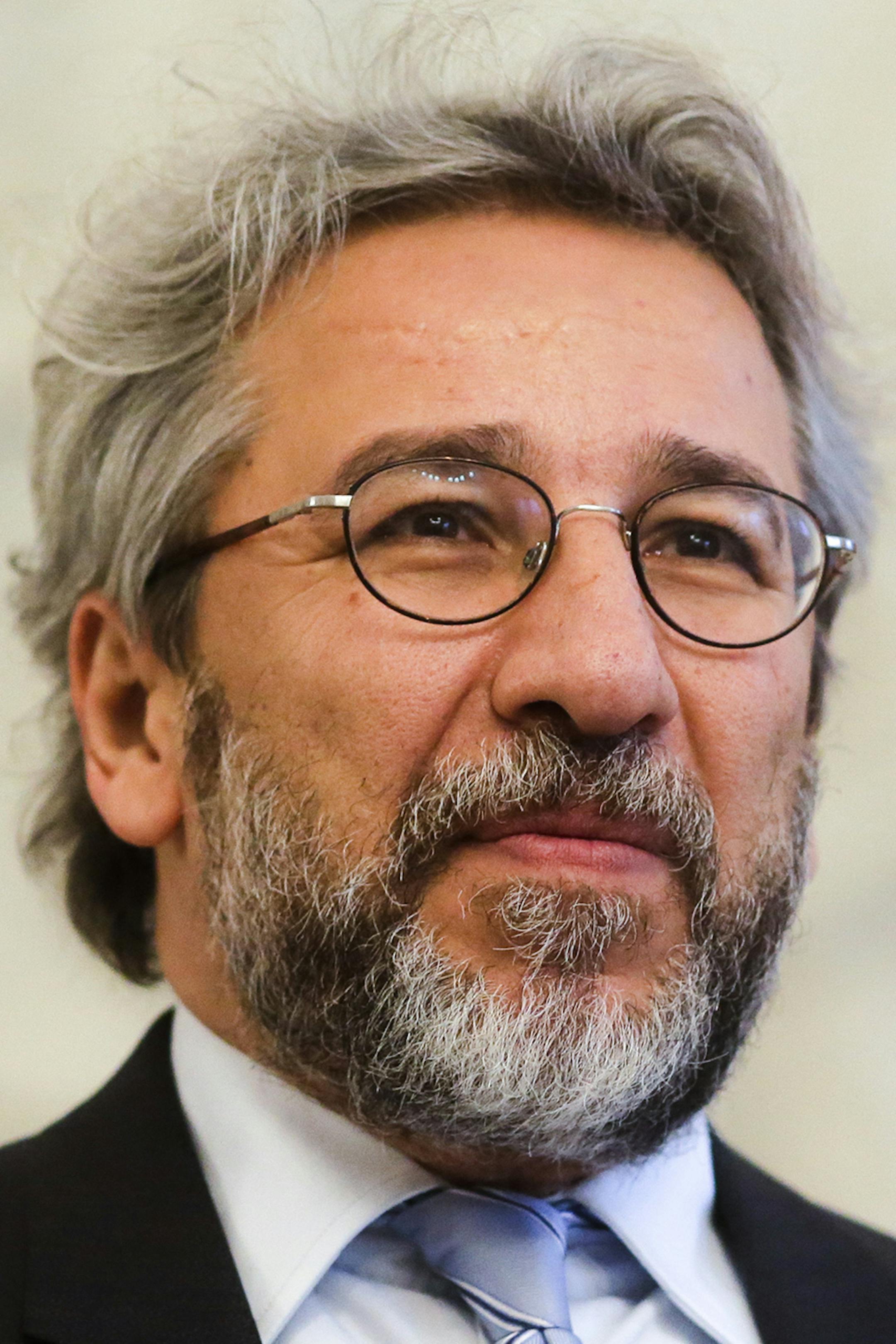 Can Dundar, the former chief editor of the Turkish newspaper Cumhuriyet, arrives for a meeting with German President Joachim Gauck at Bellevue Palace in Berlin, Monday, Nov. 7, 2016. (AP Photo/Markus Schreiber). ORG XMIT: MIN2016112817252962