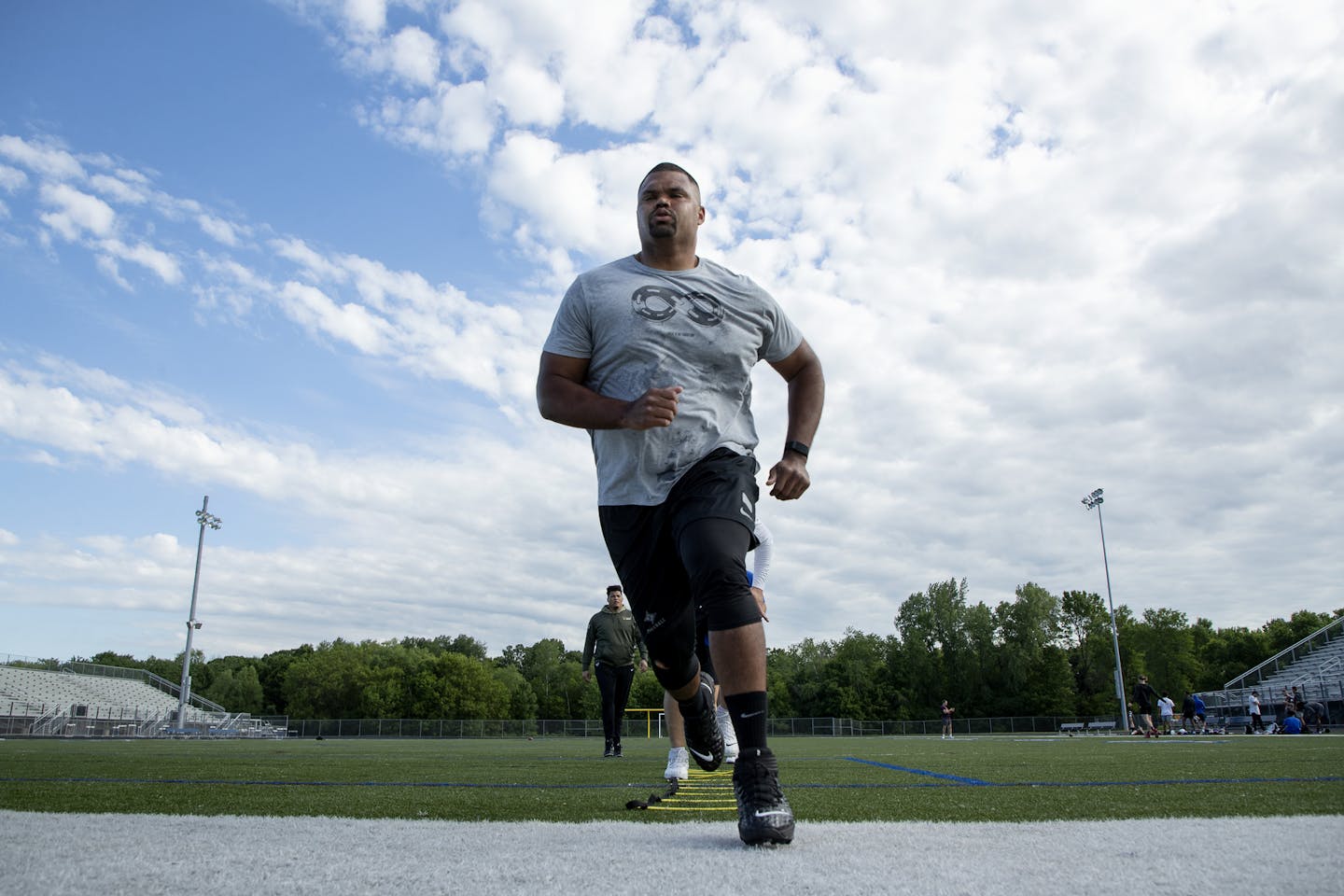 Minnesota Vikings Dakota Dozier worked out at Woodbury High School. ] CARLOS GONZALEZ • cgonzalez@startribune.com – Woodbury, MN – June 11, 2020, Woodbury High School, NFL, Minnesota Vikings, Feature on the Institute for Athletes agency, which represents a number of notable local players (Adam Thielen, Tyler Johnson, C.J. Ham, Ifeadi Odenigbo, among others) and has branched out in some different directions for a sports agency over the past few years. They're trying to go beyond just representing