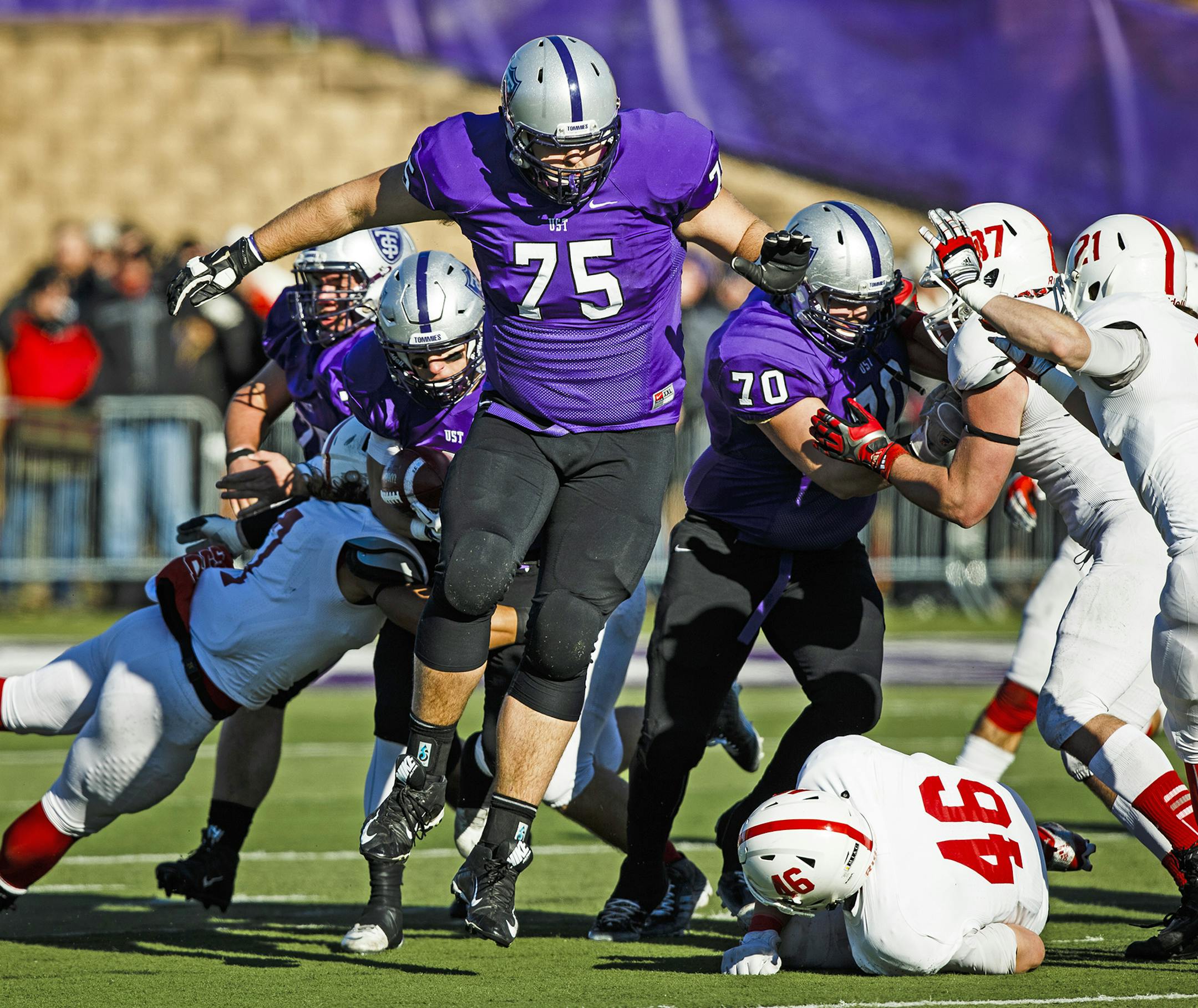 St. Thomas offensive lineman David Simmet blocked during a second-round NCAA playoff game against St. John's on Nov. 28 at O'Shaughnessy Stadium. The Tommies won 38-19.