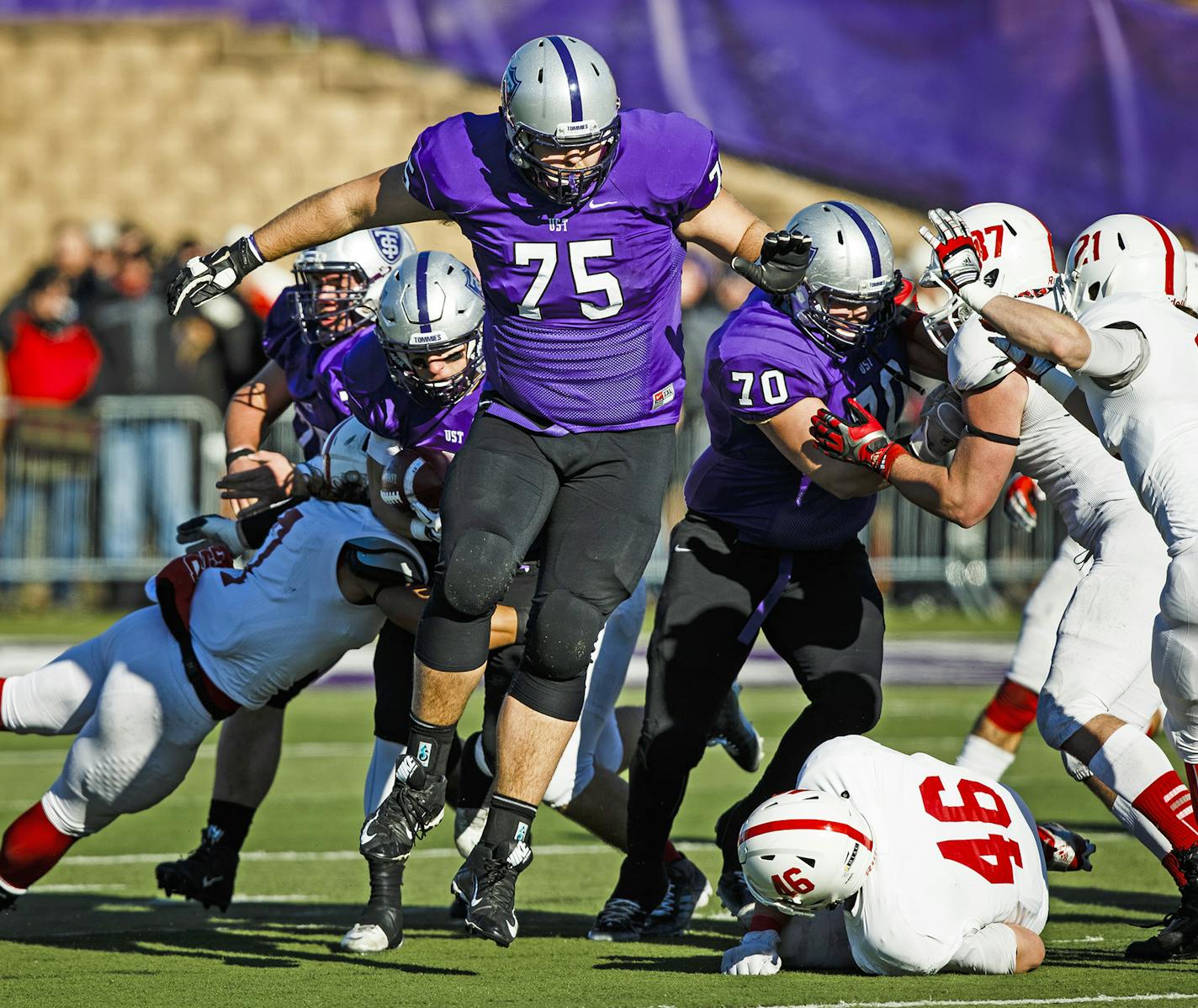 St. Thomas offensive lineman David Simmet blocked during a second-round NCAA playoff game against St. John's on Nov. 28 at O'Shaughnessy Stadium. The Tommies won 38-19.