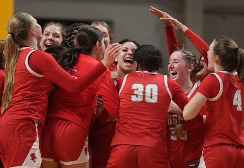 Benilde-St. Margaret's players celebrate their win over DeLaSalle.