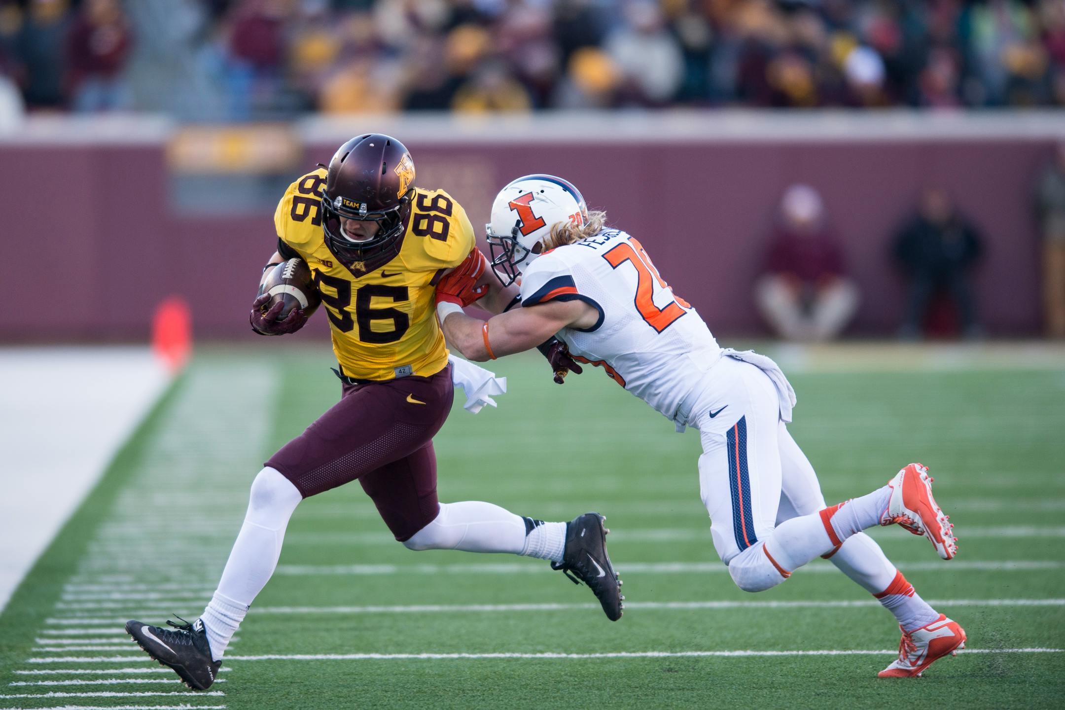 Gophers tight end Brandon Lingen (86) was forced out of bounds by Illinois' Clayton Fejedelem (20) last season. If Lingen can stay healthy, he looks ready to follow in the footsteps of former Gophers tight ends Maxx Williams, Matt Spaeth and Ben Utecht.