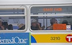 Fair goers made their way to the new bus transportation hub at the Minnesota State Fair, Sunday, August 24, 2014 in Falcon Heights, MN. ] (ELIZABETH F