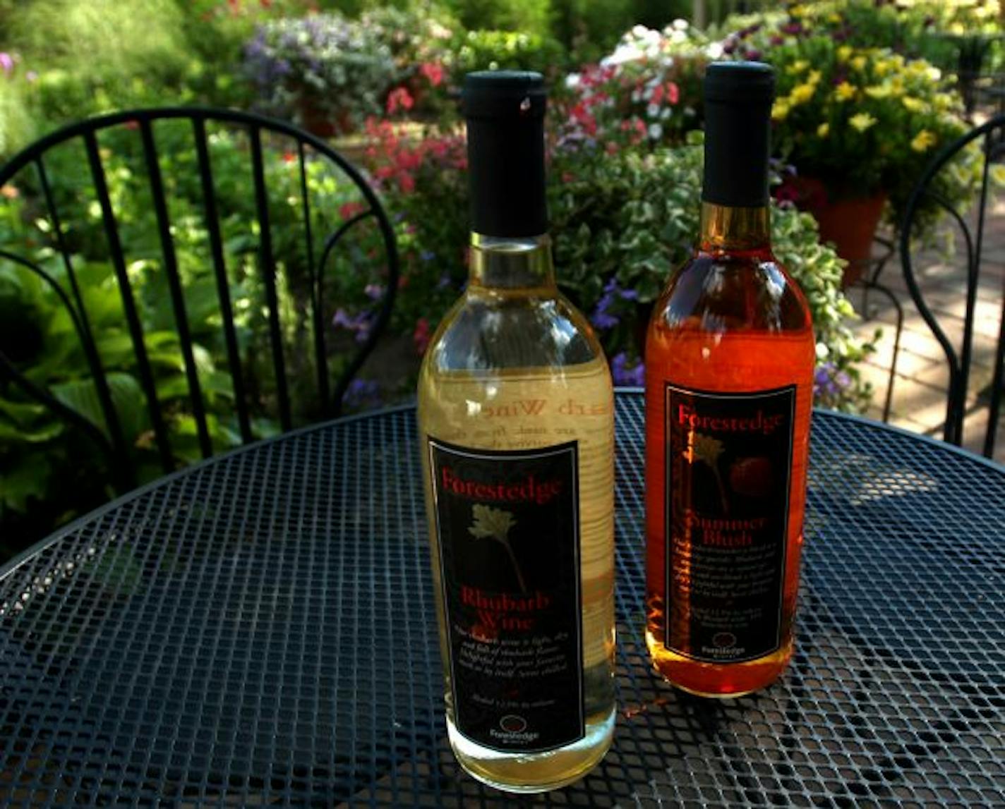 Rhubarb, left, and Summer Blush (a rhubarb-strawberry blend) are two varieties of fruit wine from Forestedge Winery.