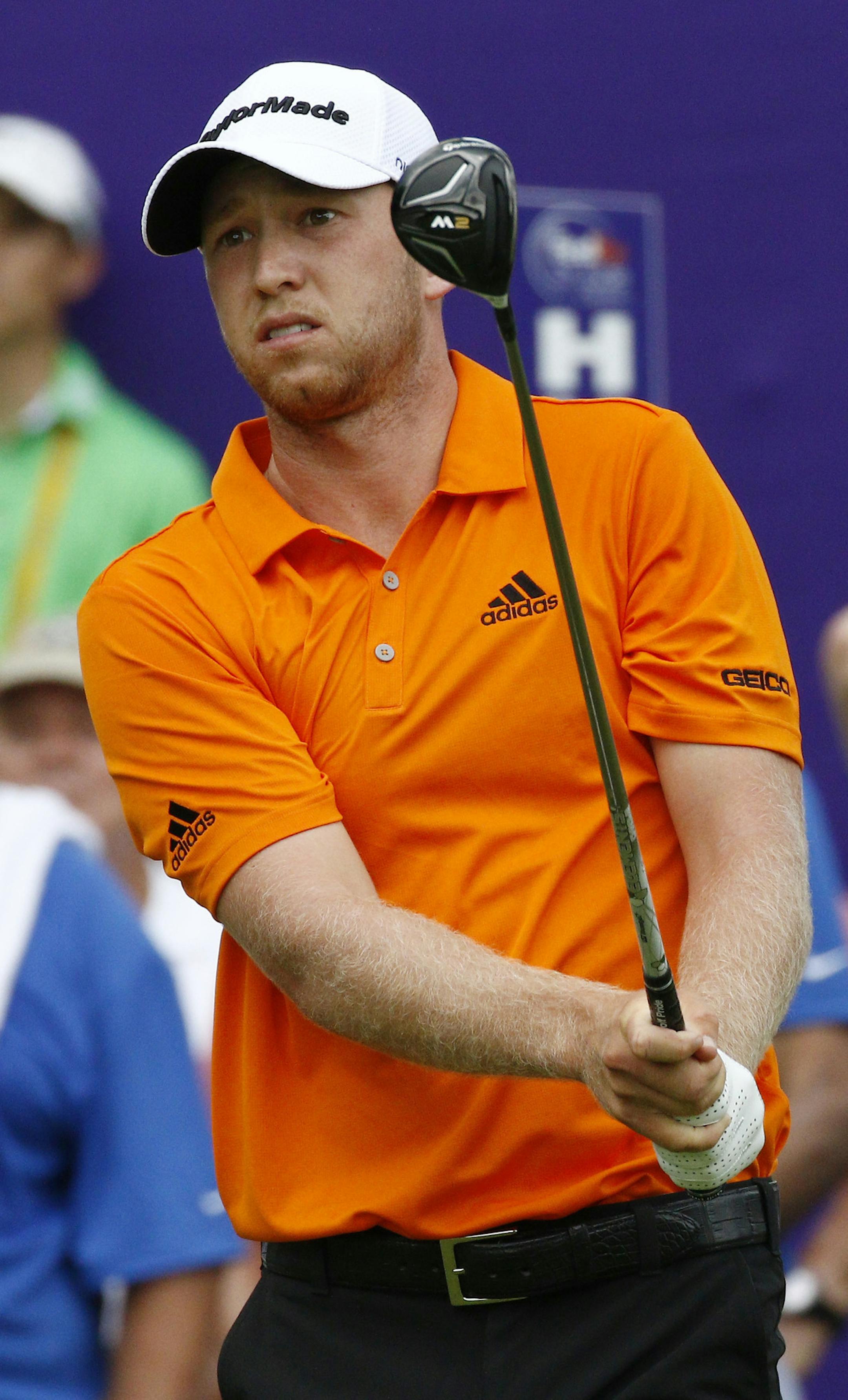 Daniel Berger watches his tee shot on the No. 1 tee of the FedEx St. Jude Classic Golf Tournament, Sunday, June 12, 2016, in Memphis, Tenn. Play was suspended due to hazardous weather. (AP Photo/Rogelio V. Solis)