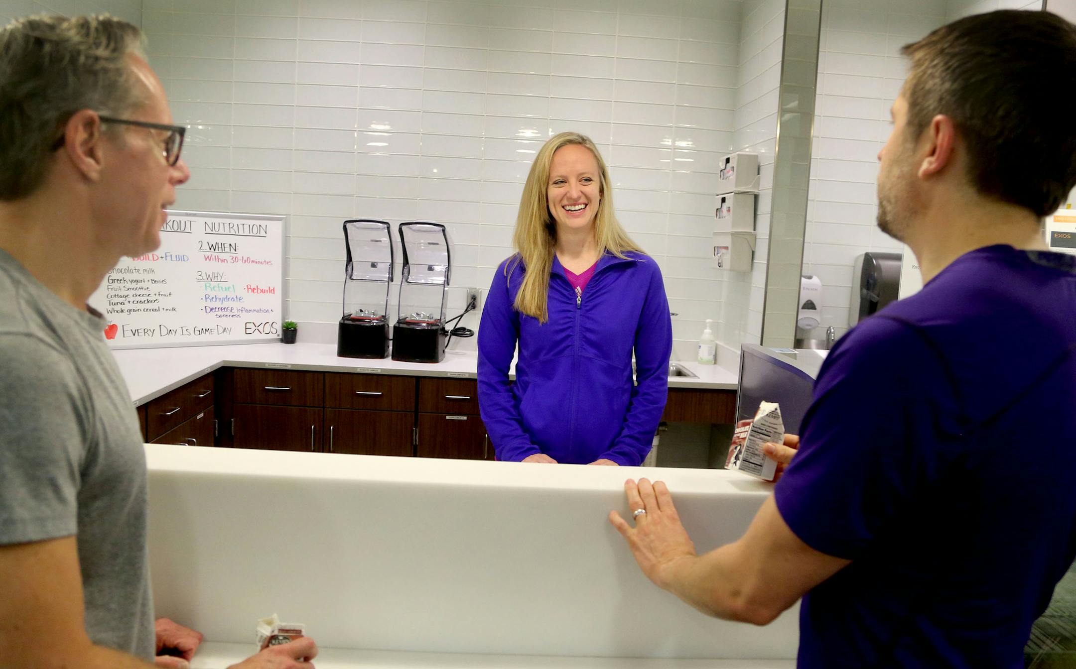 Jill Merkel is the performance dietitian at EXOS/Mayo Clinic Sports Medicine Center. She was seen working with clients Lindsay Kruh, left, and Shane Swanson, right, both of Minneapolis Wednesday, May 4, 2016, at EXOS/Mayo Clinic Sports Medicine Center in downtown Minneapolis, MN.](DAVID JOLES/STARTRIBUNE)djoles@startribune.com Staying fit isn't all about exercising. Nutrition plays a huge role in keeping healthy and lean.**Jill Merkel, Lindsay Kruh, Shane Swanson,cq