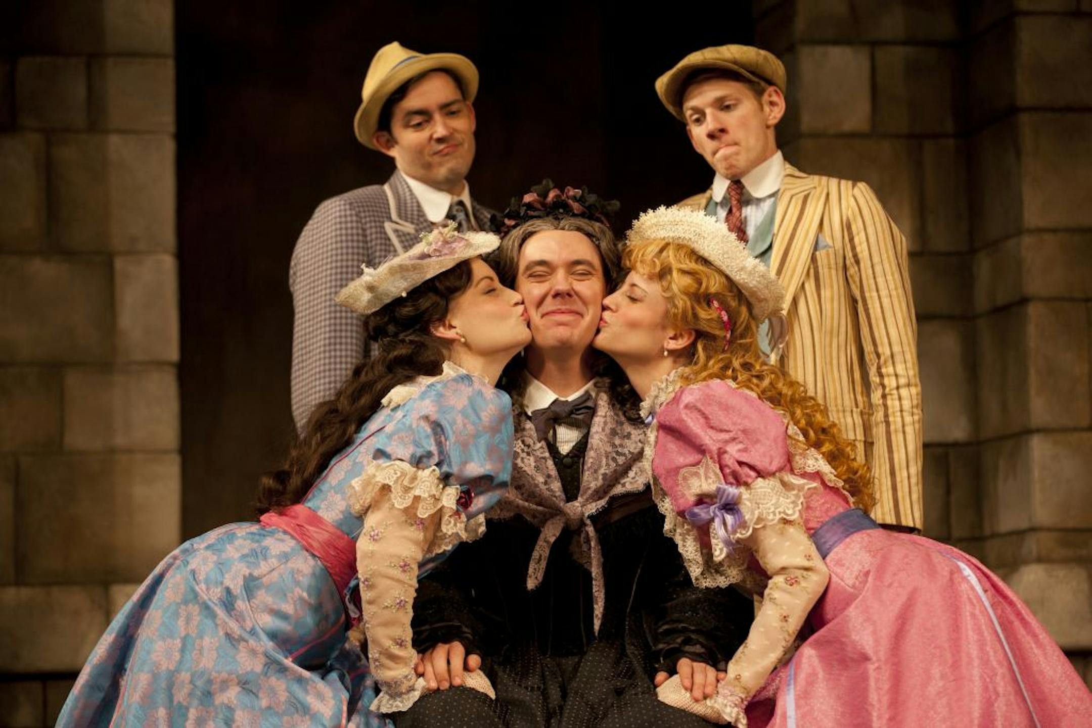 John Skelley, center, in the title role, gets all the attention in "Charley's Aunt" at the Guthrie Theater. Clockwise from upper left are Matthew Amendt, Ben Mandelbaum, Valeri Mudek and Ashley Rose Montondo.