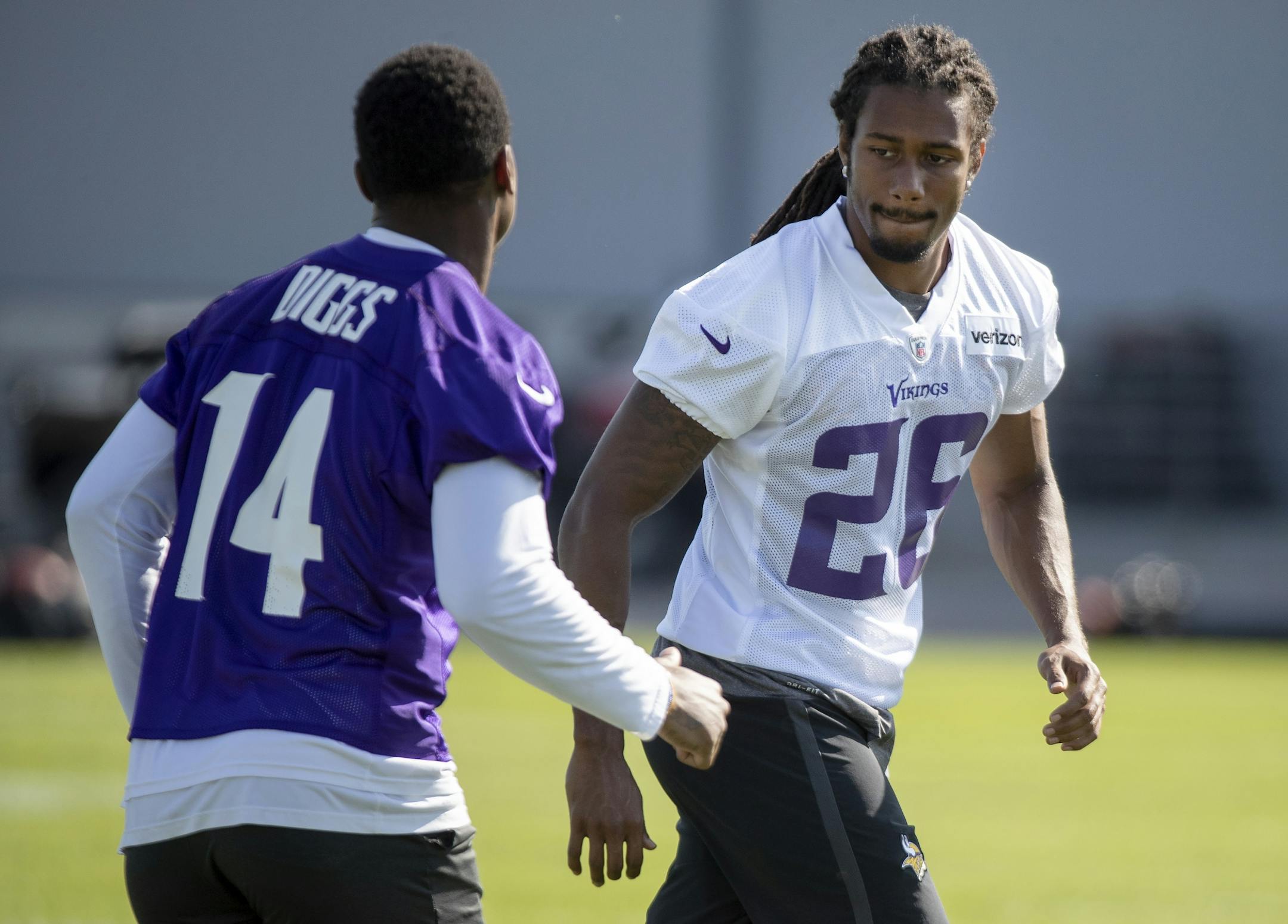 Minnesota Vikings' Trae Waynes (26) covered Stefon Diggs (14) during practice.