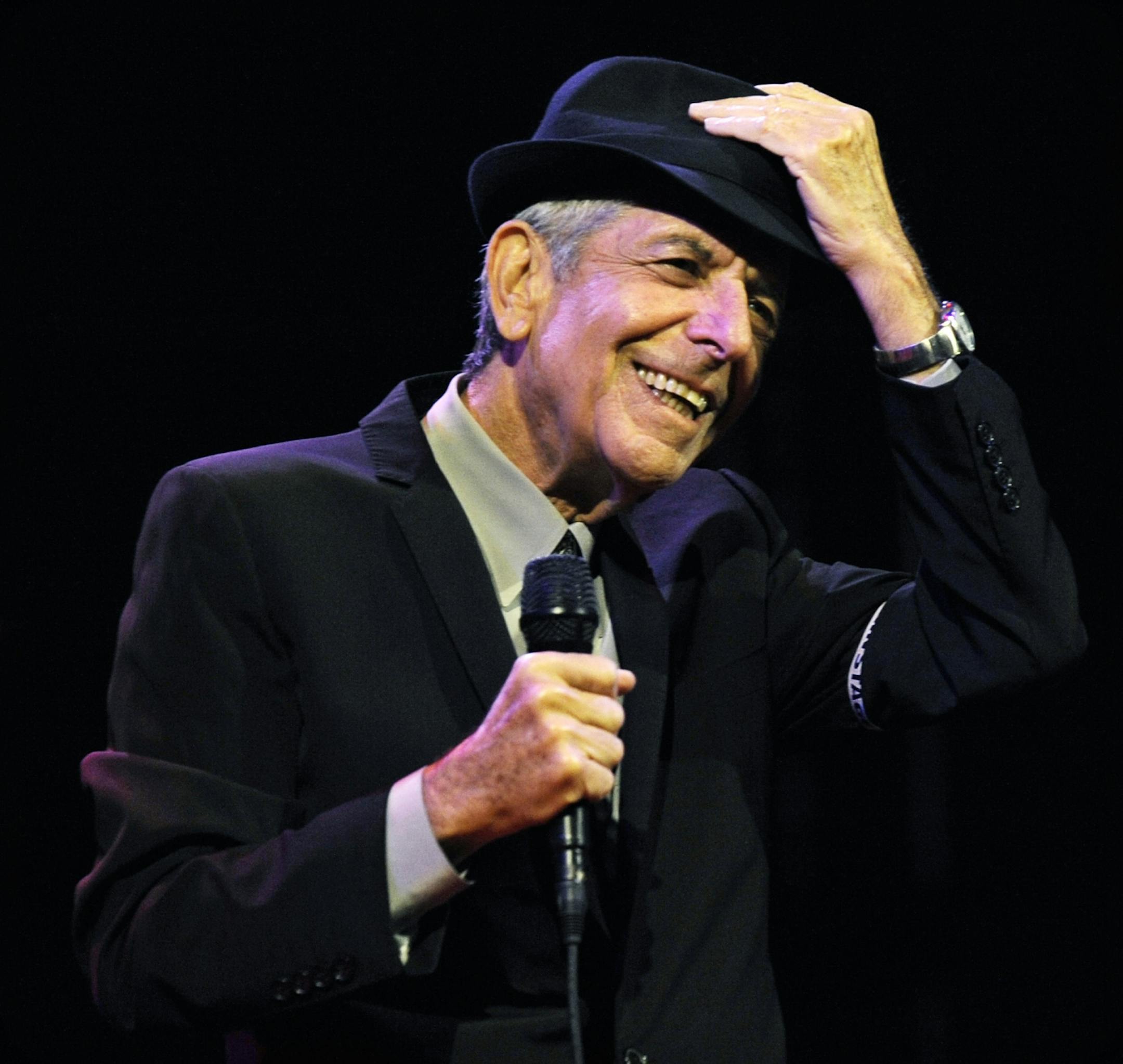 FILE - In this April 17, 2009 file photo Leonard Cohen performs during the first day of the Coachella Valley Music & Arts Festival in Indio, Calif.