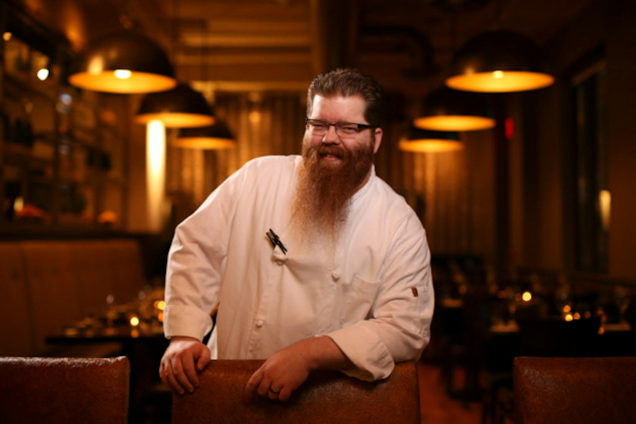 Chef Mike DeCamp in the dining room at Monello Wednesday evening.  ]  JEFF WHEELER ' jeff.wheeler@startribune.com    Chef Mike DeCamp is at the helm of Monello, the new restaurant on the ground floor of the Hotel Ivy in downtown Minneapolis. The basement bar is Constantine. A selection of food offerings were photographed Wednesday evening, November 11, 2015.
