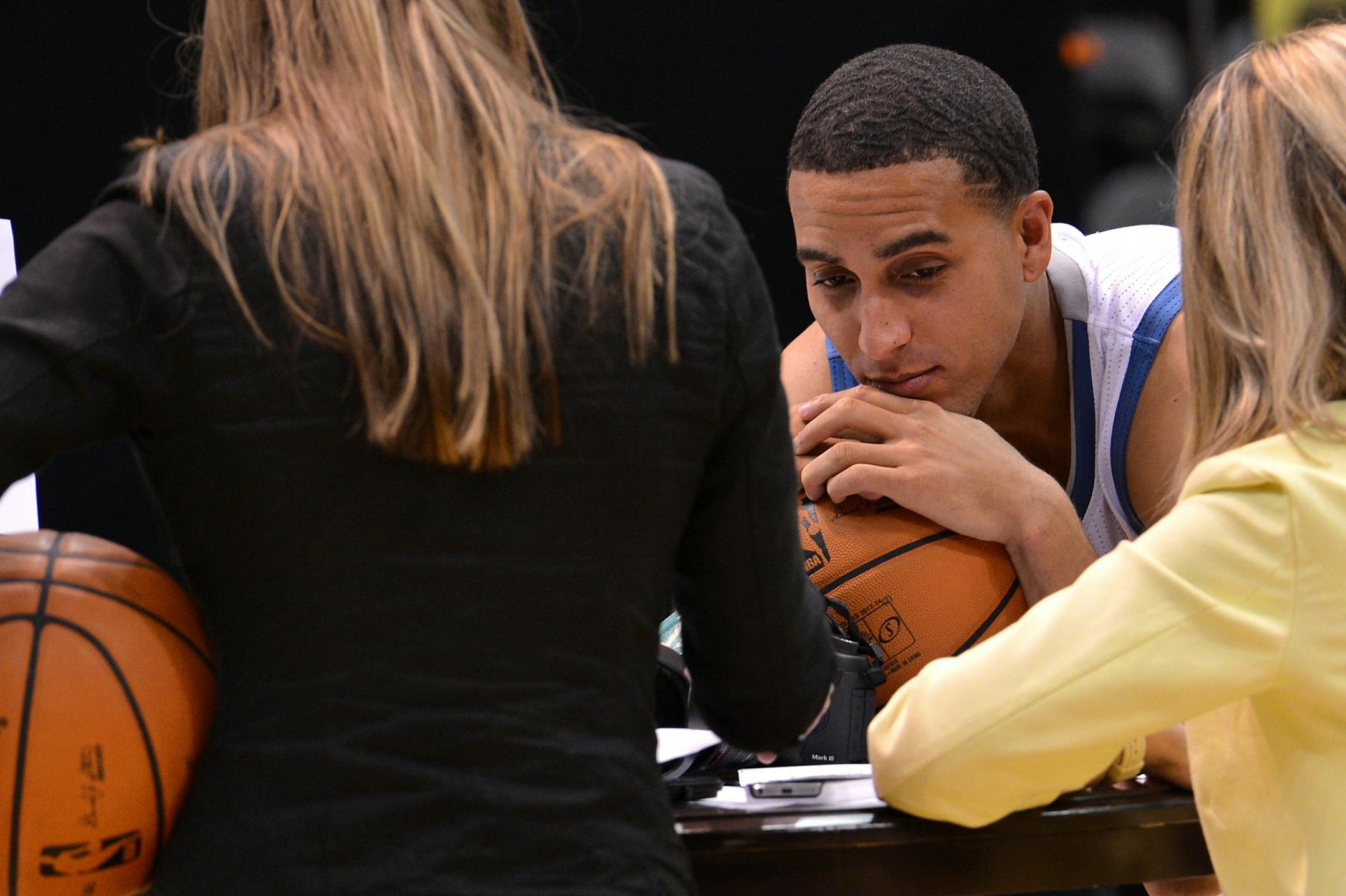 Kevin Martin takes a break between promotional photos during the Timberwolves media day Monday at the Target Center.