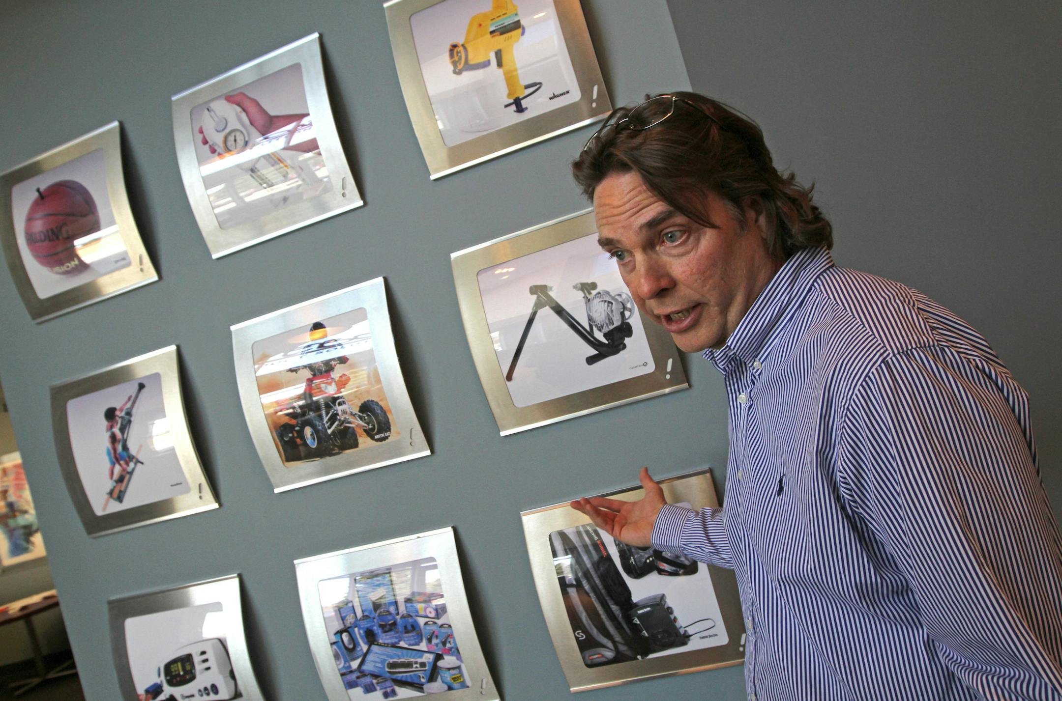 Whiteboard CEO and President Rick Polk, with some of the products Whiteboard has worked on. Photographed on 4/4/13 at the Eden Prairie MN., headquarters. Whiteboard Product Solutions designs prototypes and solves manufacturing design problems for hundreds of companies such as 3M, Toro, Arctic Cat, Ecolab, Medtronic, etc. Whiteboard engineers/designers) design over a 1,000 products a year for 3M, Toro, Medtronic, and other firms that need a new product or need to flesh out why a product won't wor